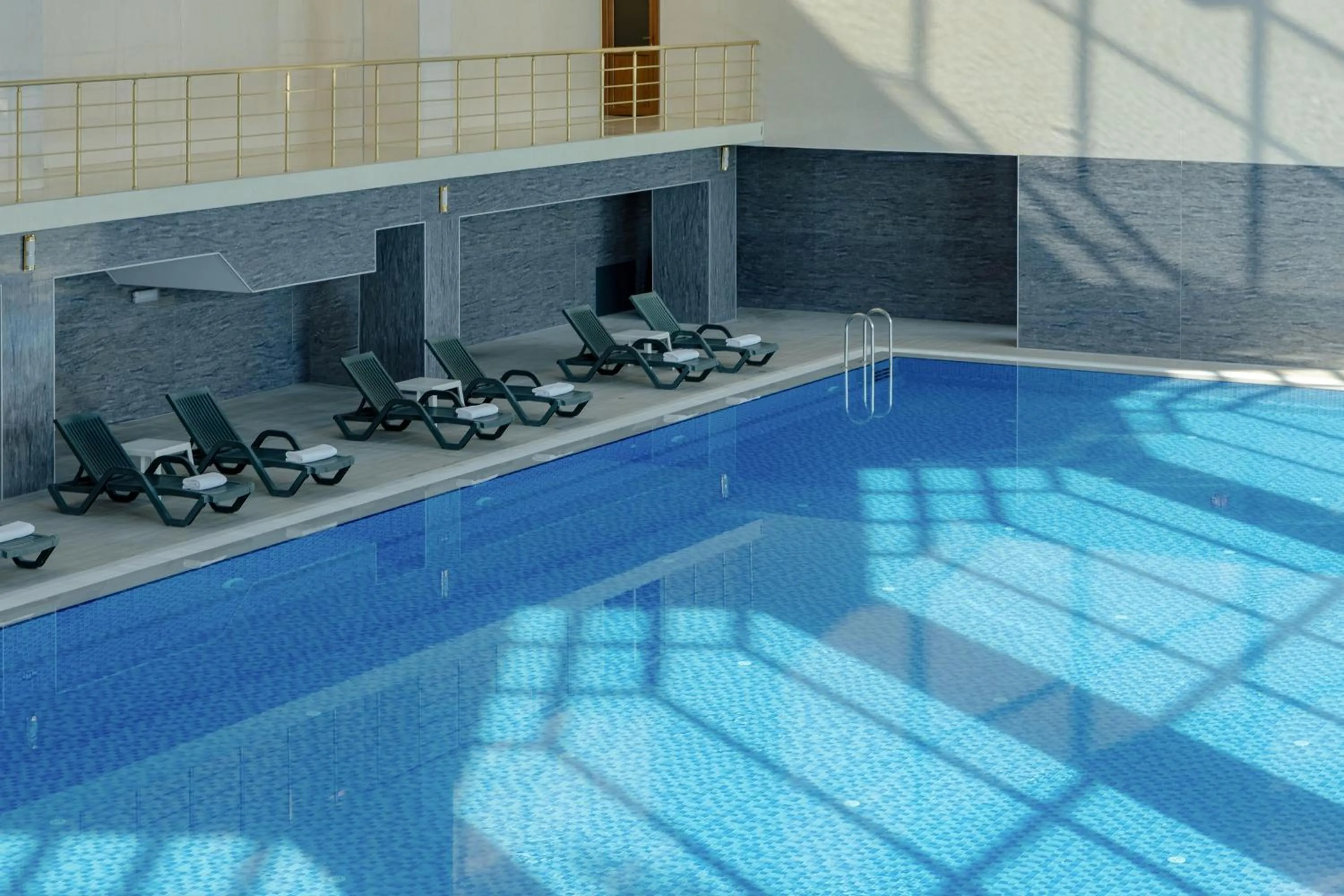 Swimming pool in Ramada Plaza by Wyndham Gence