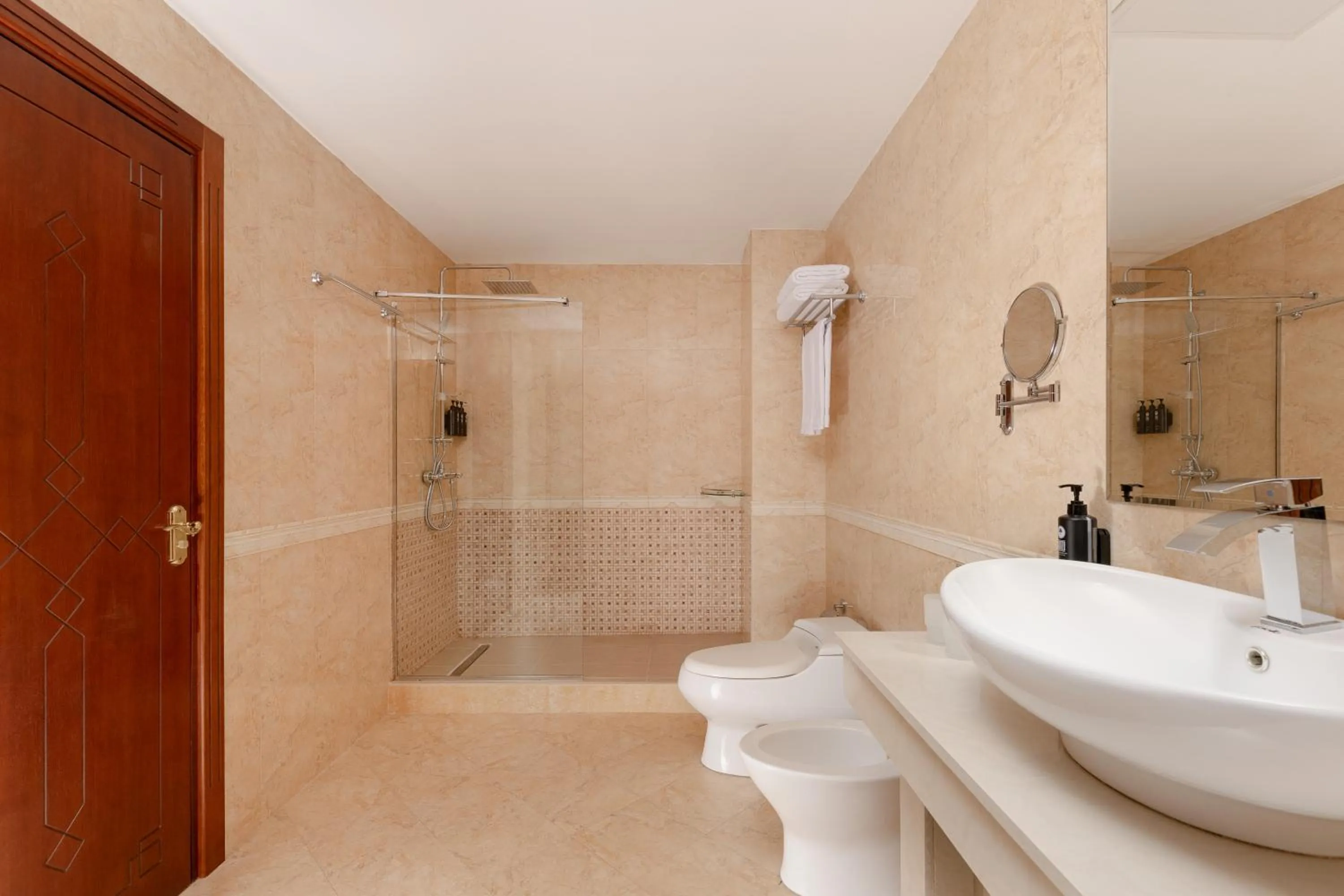 Bathroom in Ramada Plaza by Wyndham Gence