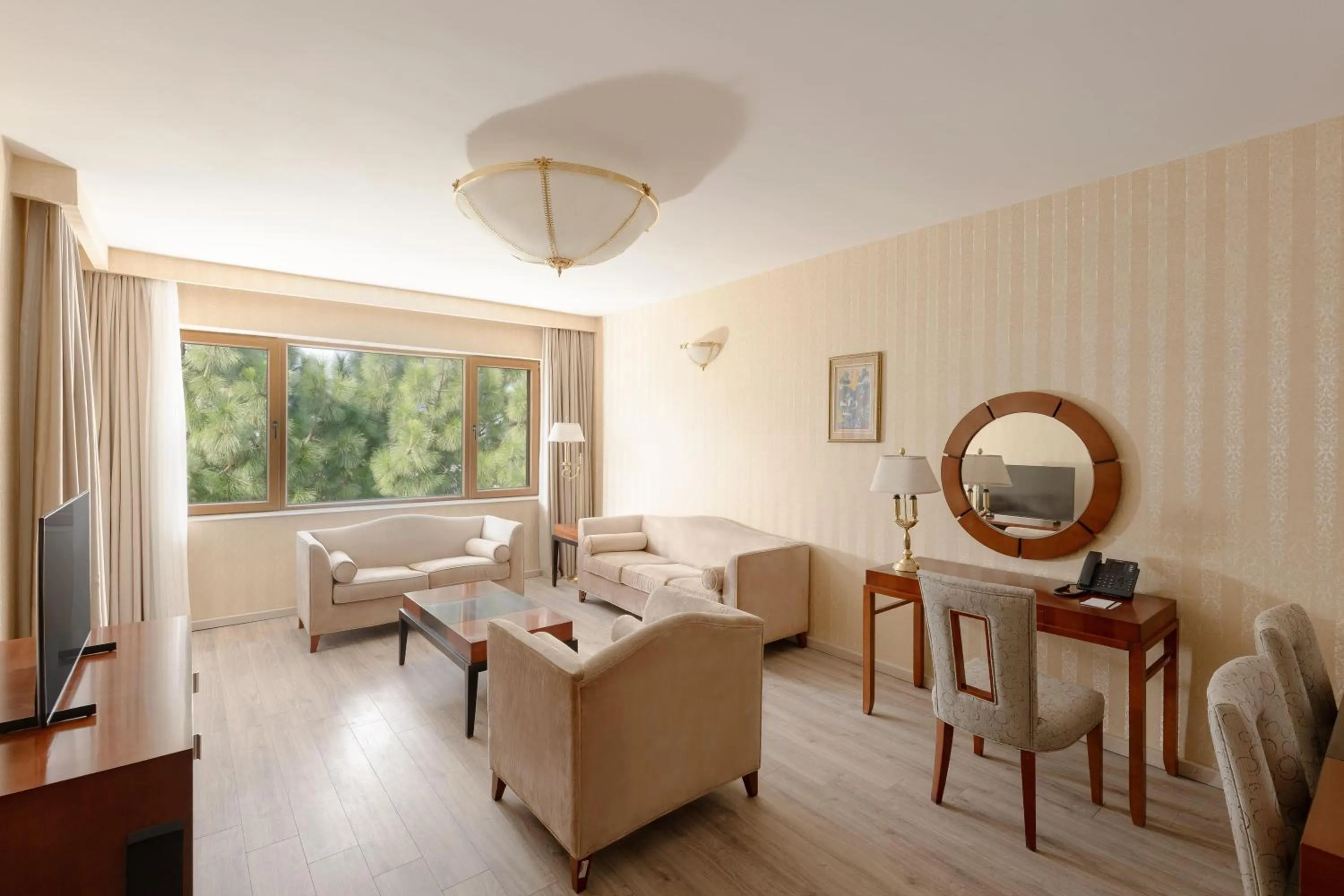 Photo of the whole room in Ramada Plaza by Wyndham Gence