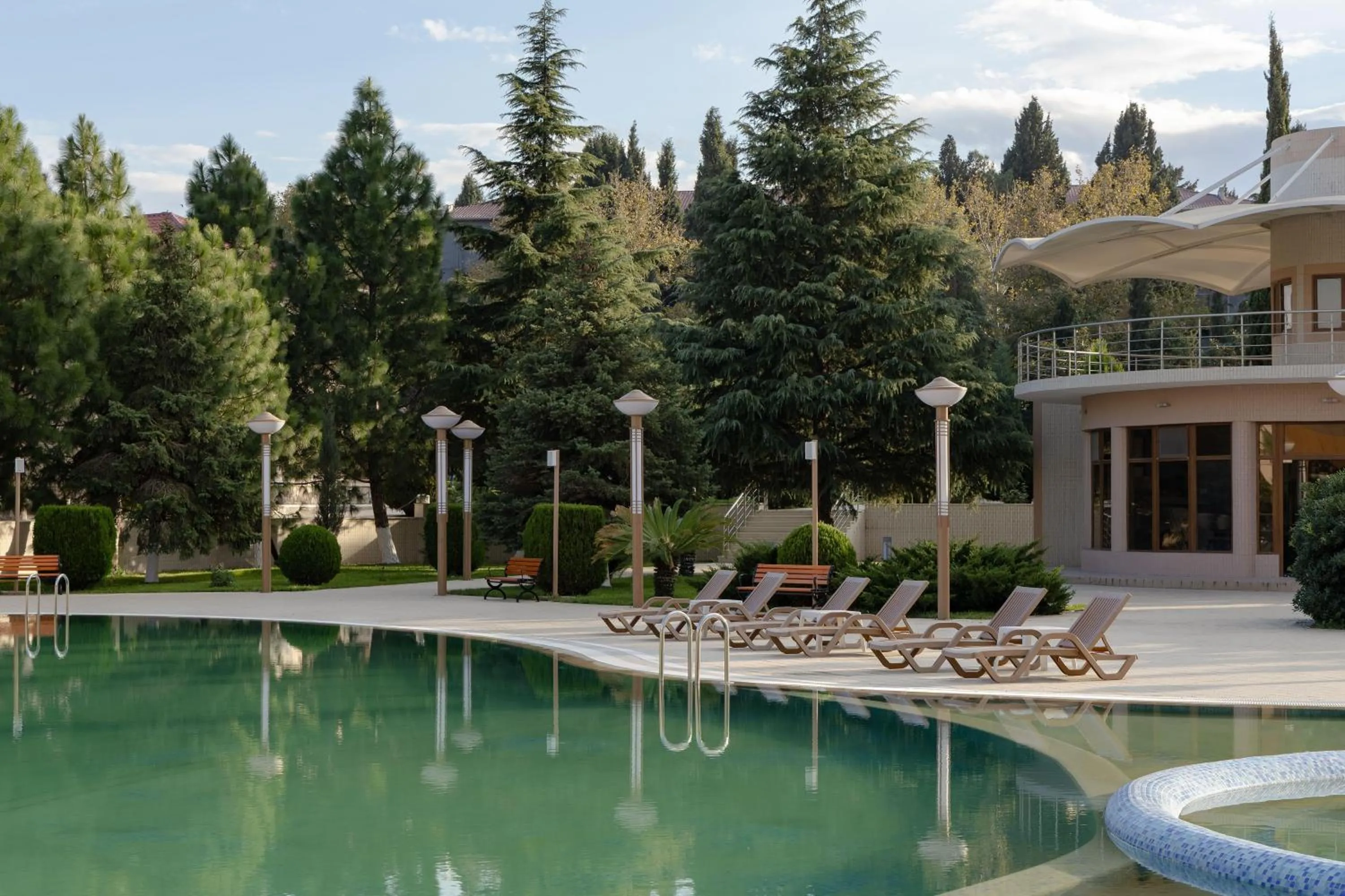 Swimming pool in Ramada Plaza by Wyndham Gence