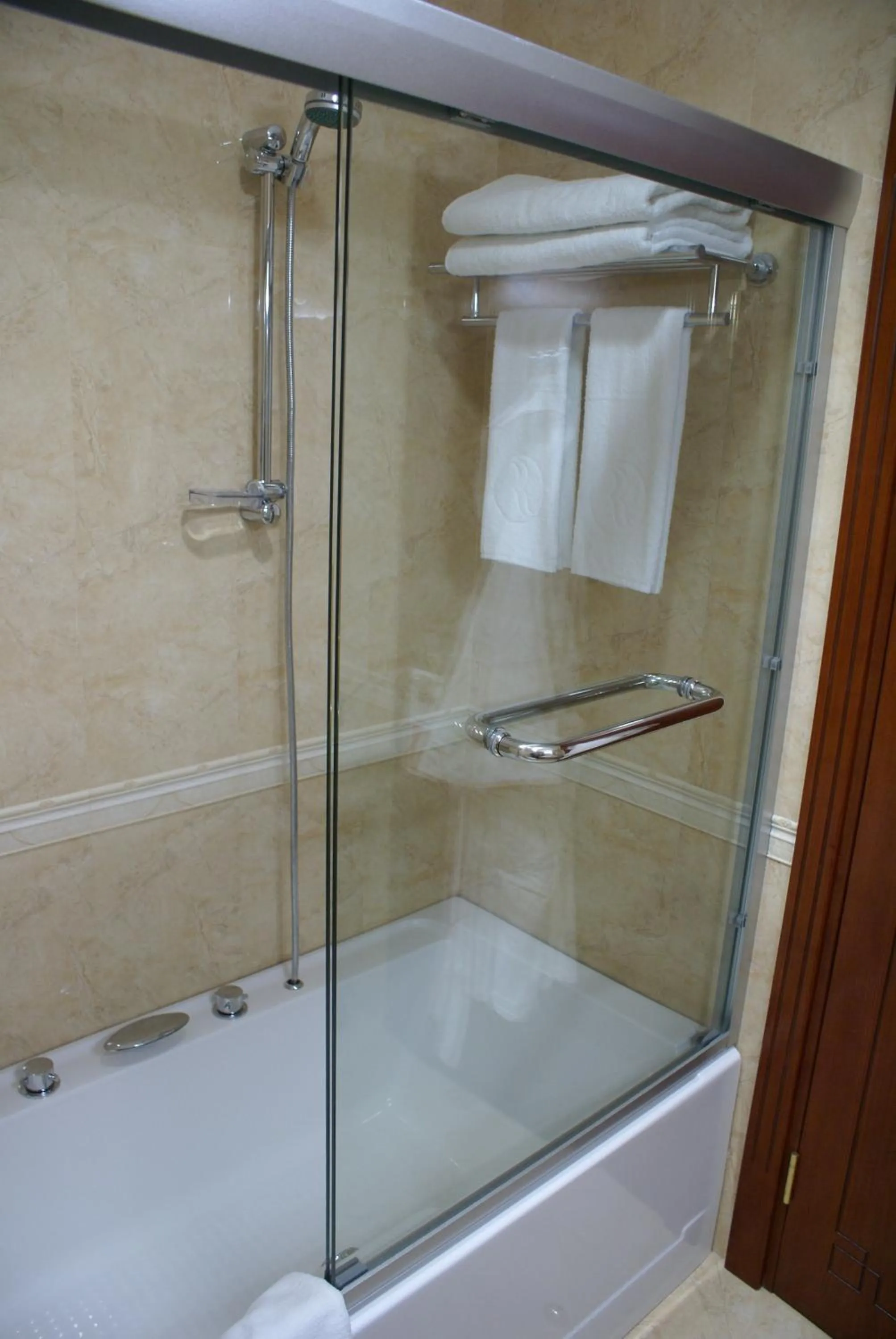 Bathroom in Ramada Plaza by Wyndham Gence