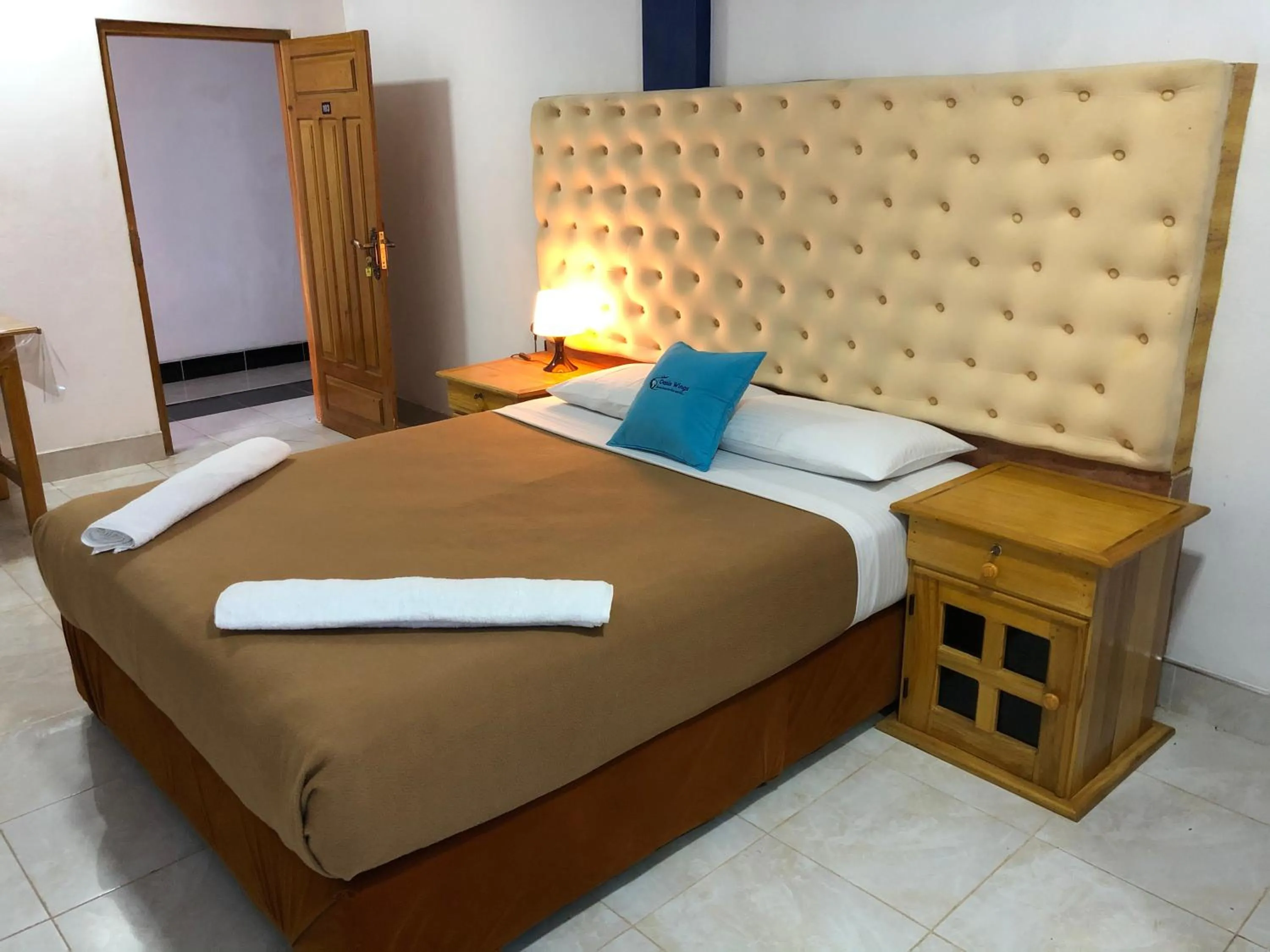 Bed in Oasis Wings Hotel