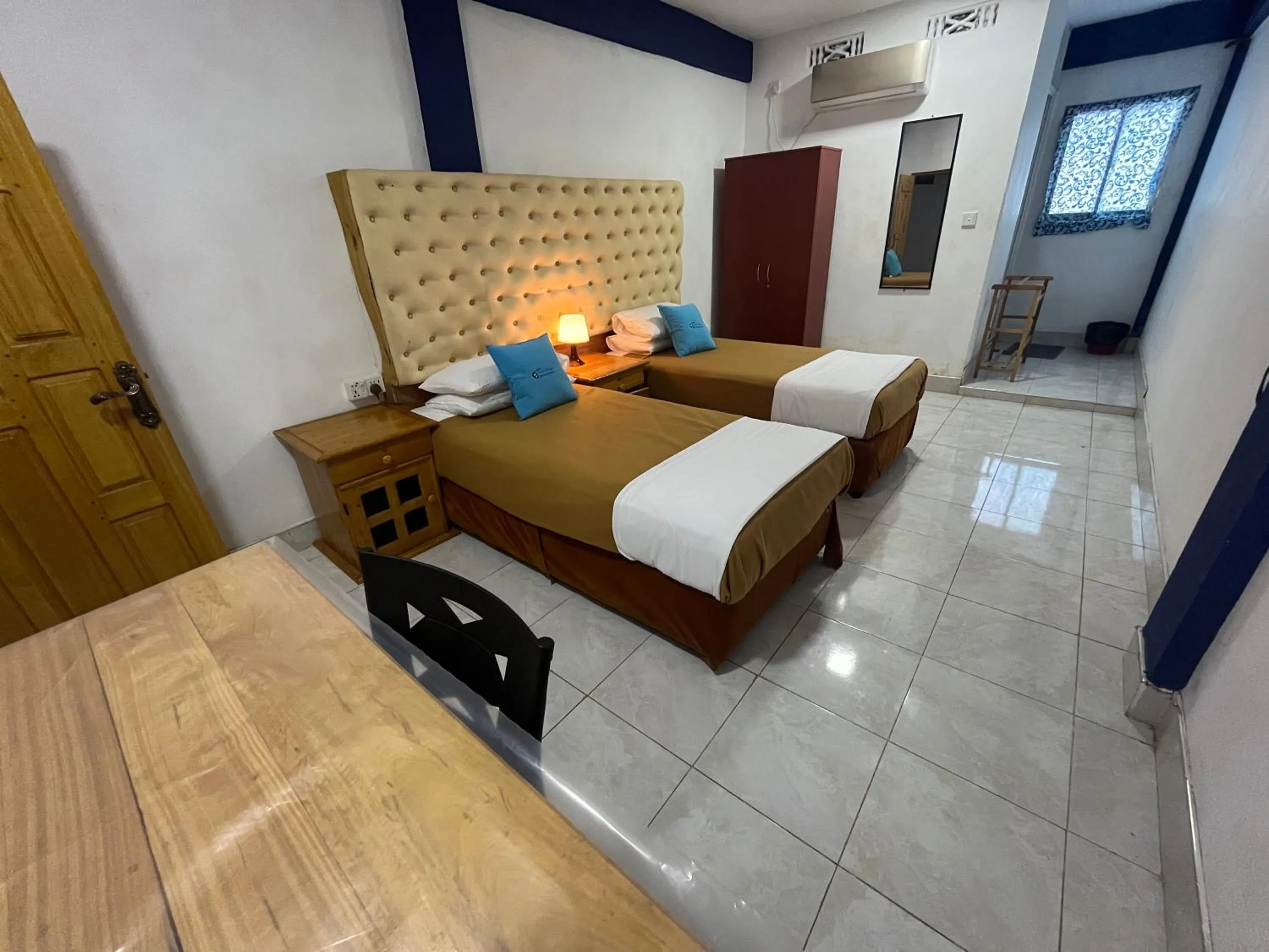 Bed in Oasis Wings Hotel