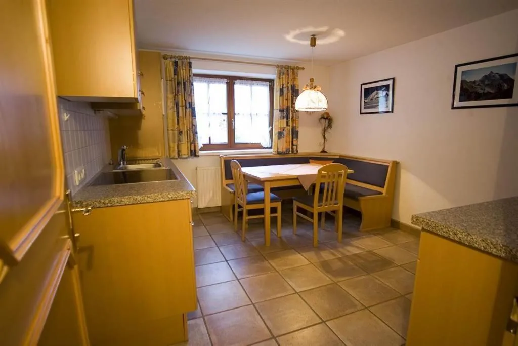 Kitchen or kitchenette in Gasthaus Muntafuner Stöbli