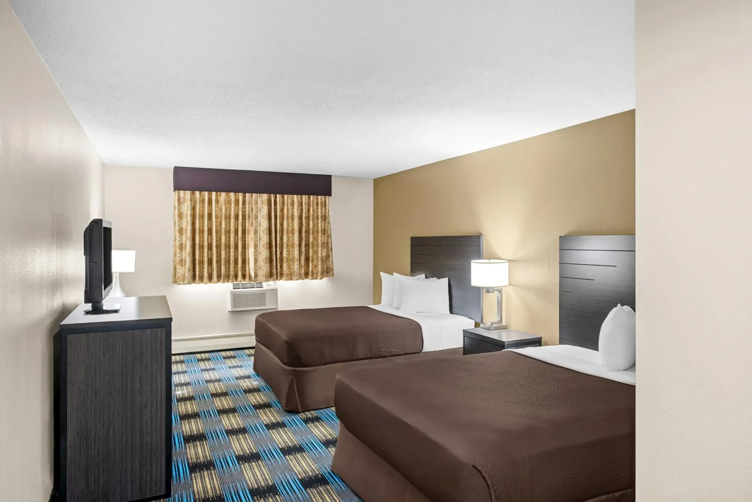 Bed in Rodeway Inn Grandville - Grand Rapids Bed in Rodeway Inn Grandville - Grand Rapids