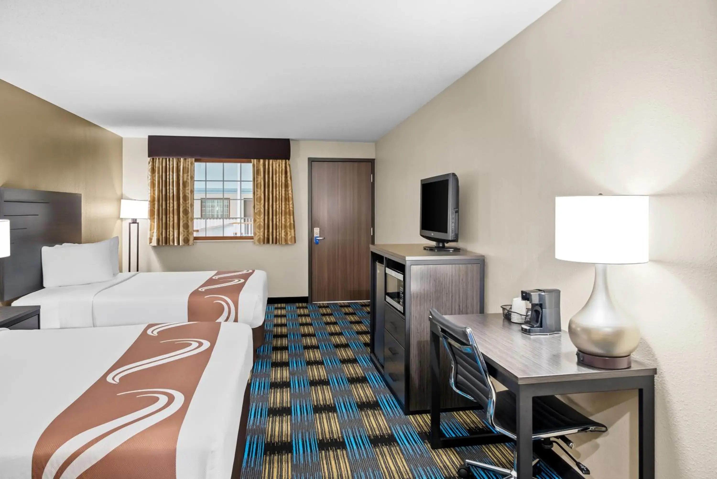 Queen Room with Two Queen Beds - Non-Smoking/Poolside in Rodeway Inn Grandville - Grand Rapids Queen Room with Two Queen Beds - Non-Smoking/Poolside in Rodeway Inn Grandville - Grand Rapids