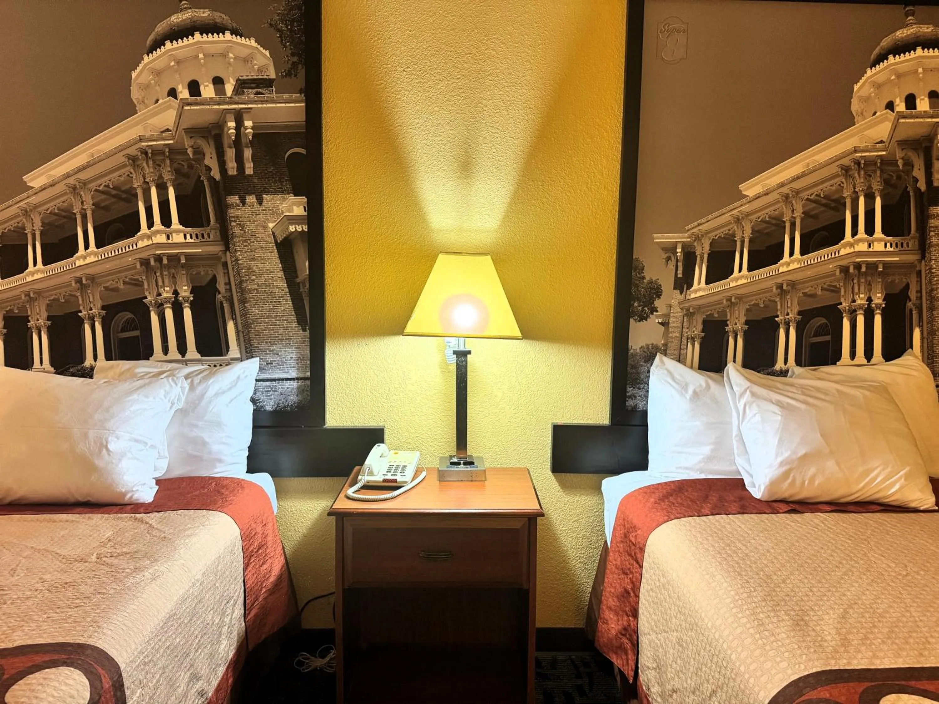 Bed in Super 8 by Wyndham Hattiesburg South