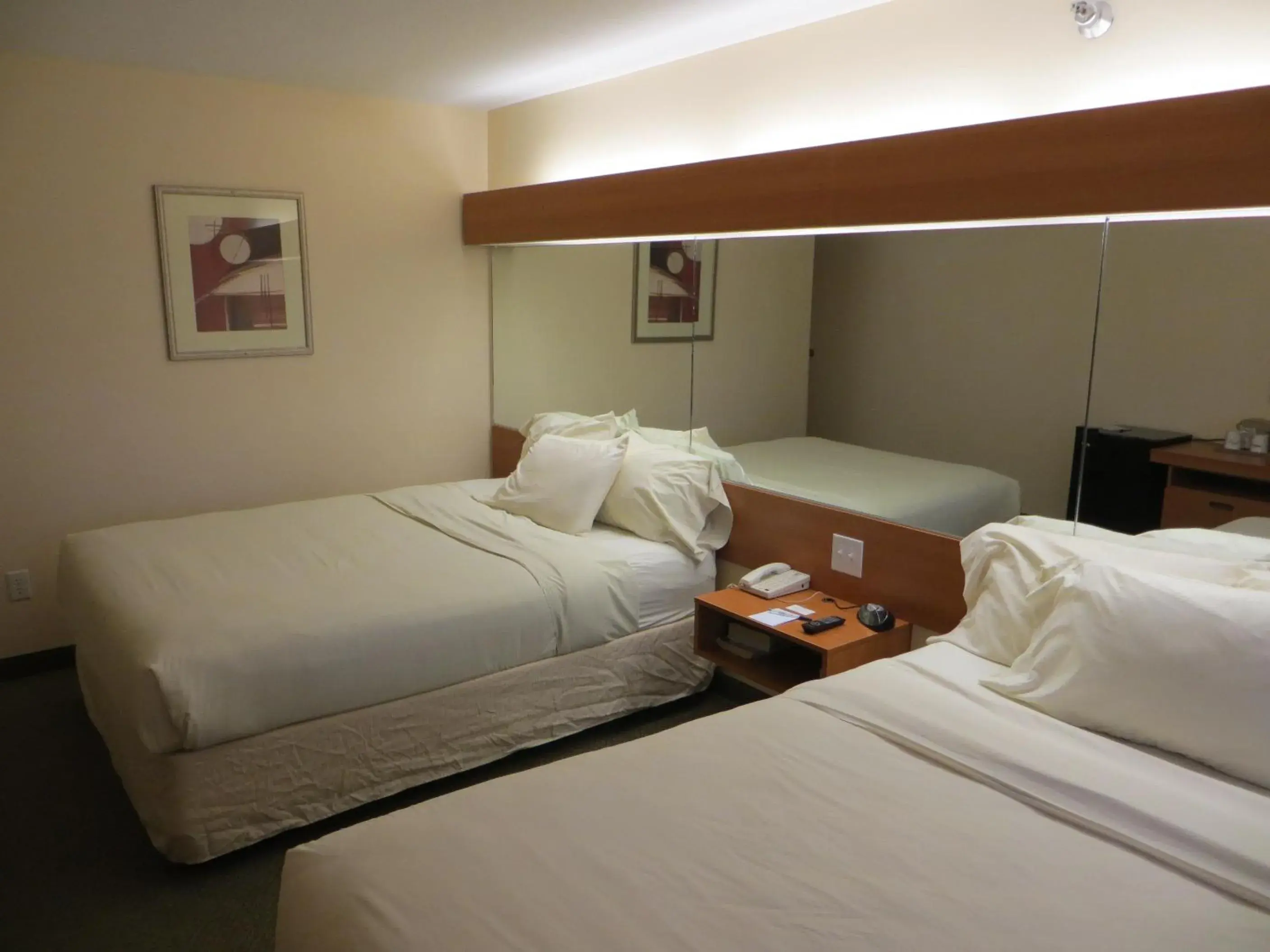 Bed in Microtel Inn & Suites by Wyndham Colfax Bed in Microtel Inn & Suites by Wyndham Colfax