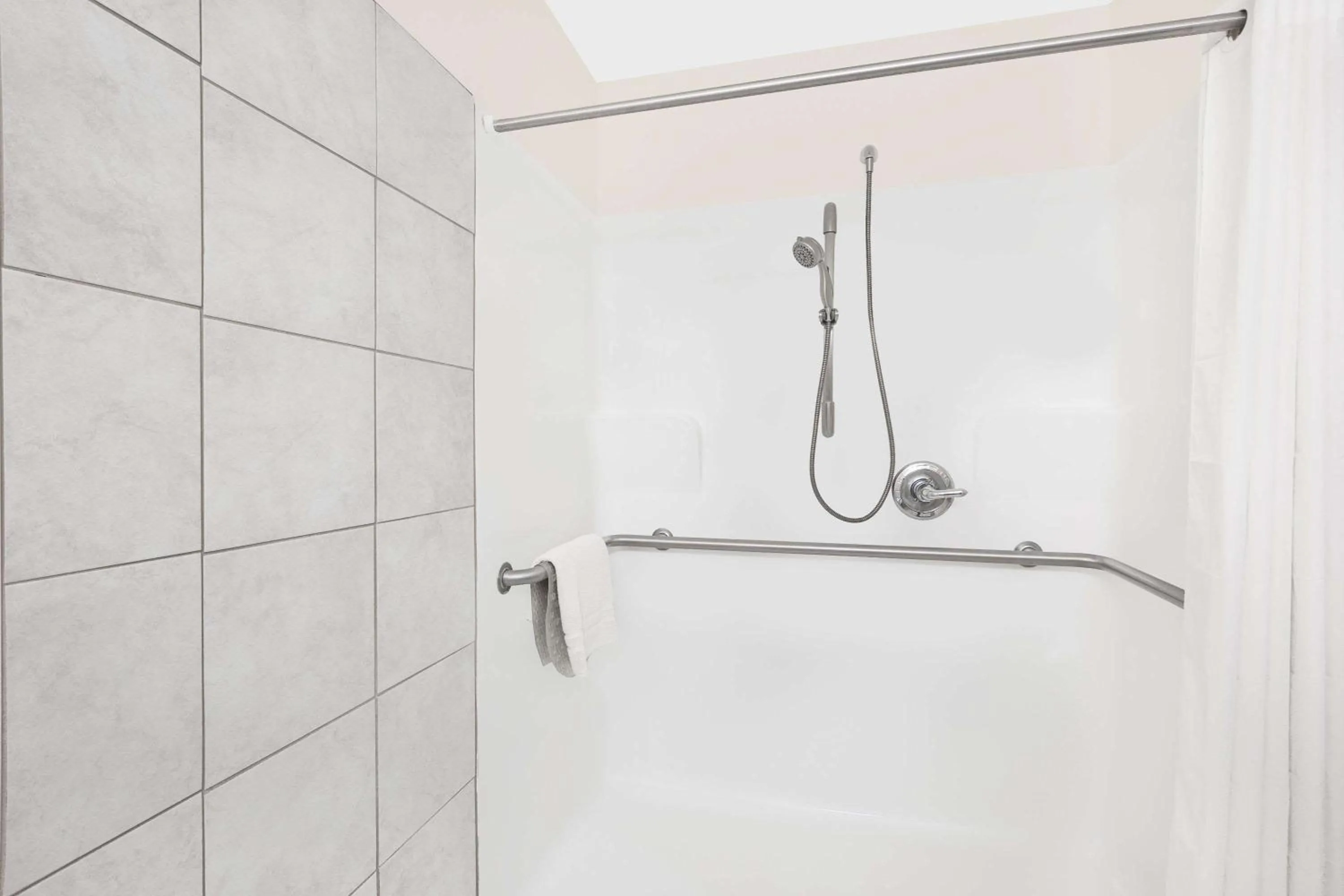 Shower in Microtel Inn & Suites by Wyndham Colfax