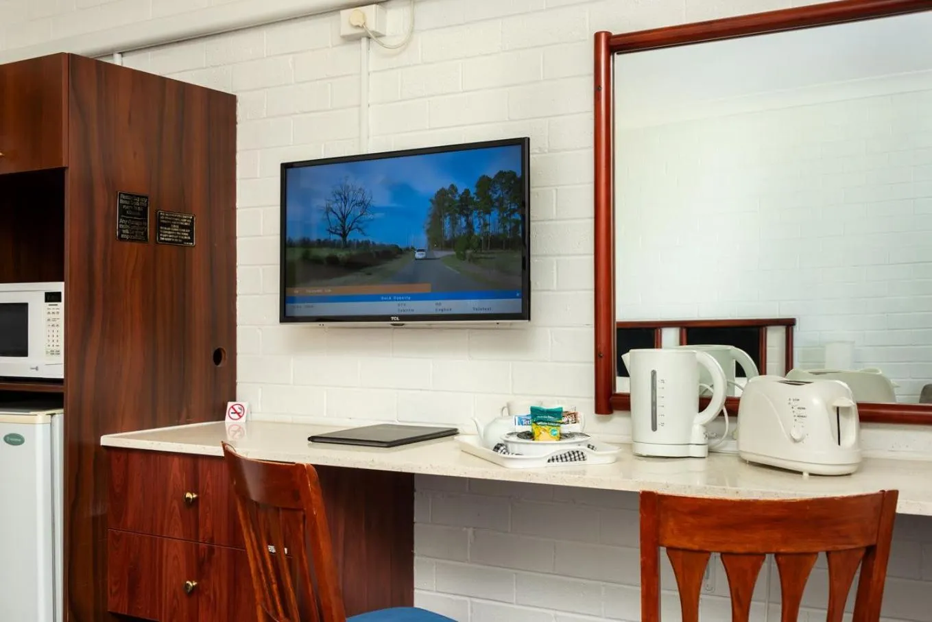 Bedroom in Pigeon House Motor Inn