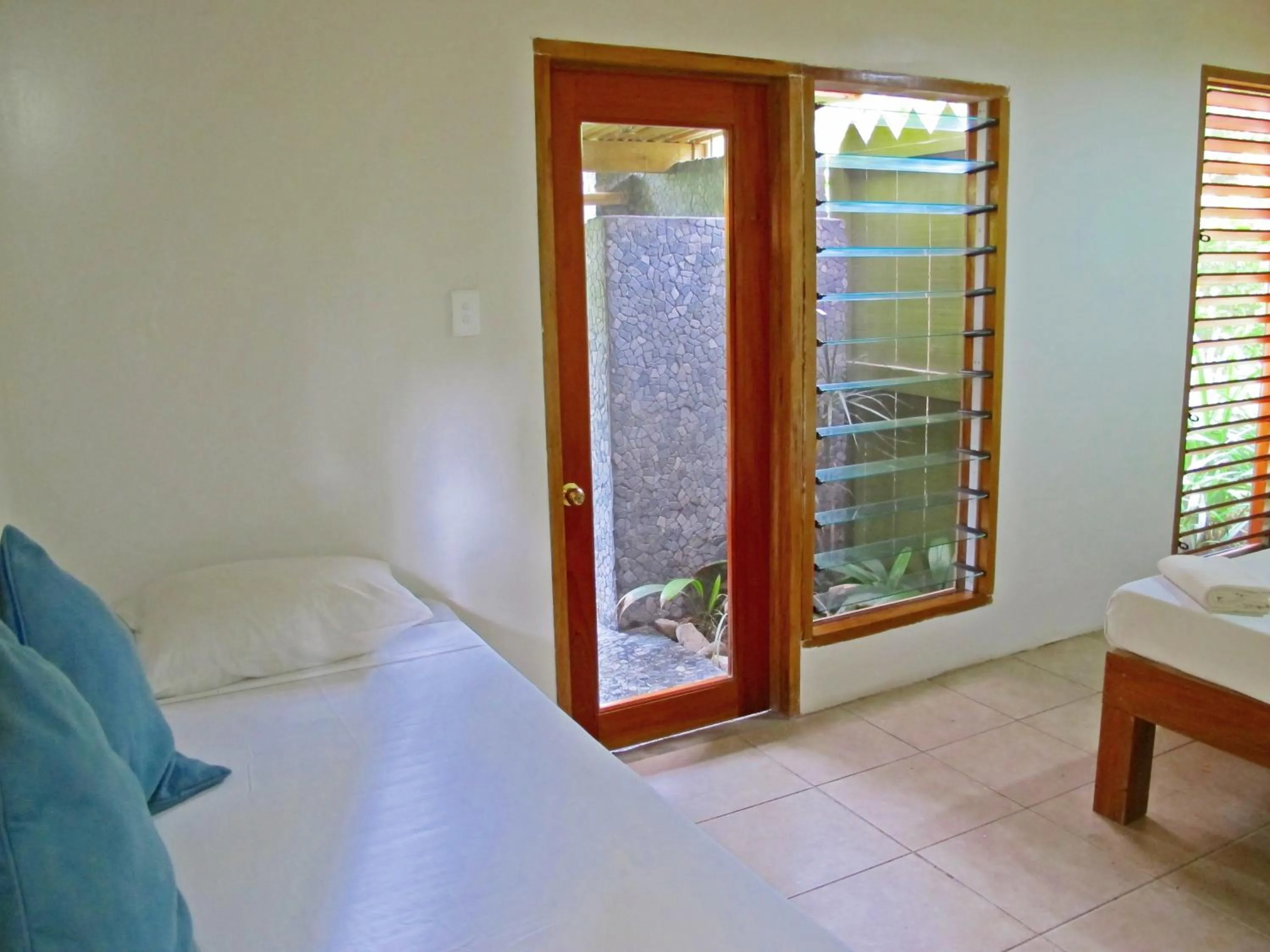 Bed in Beachouse Resort