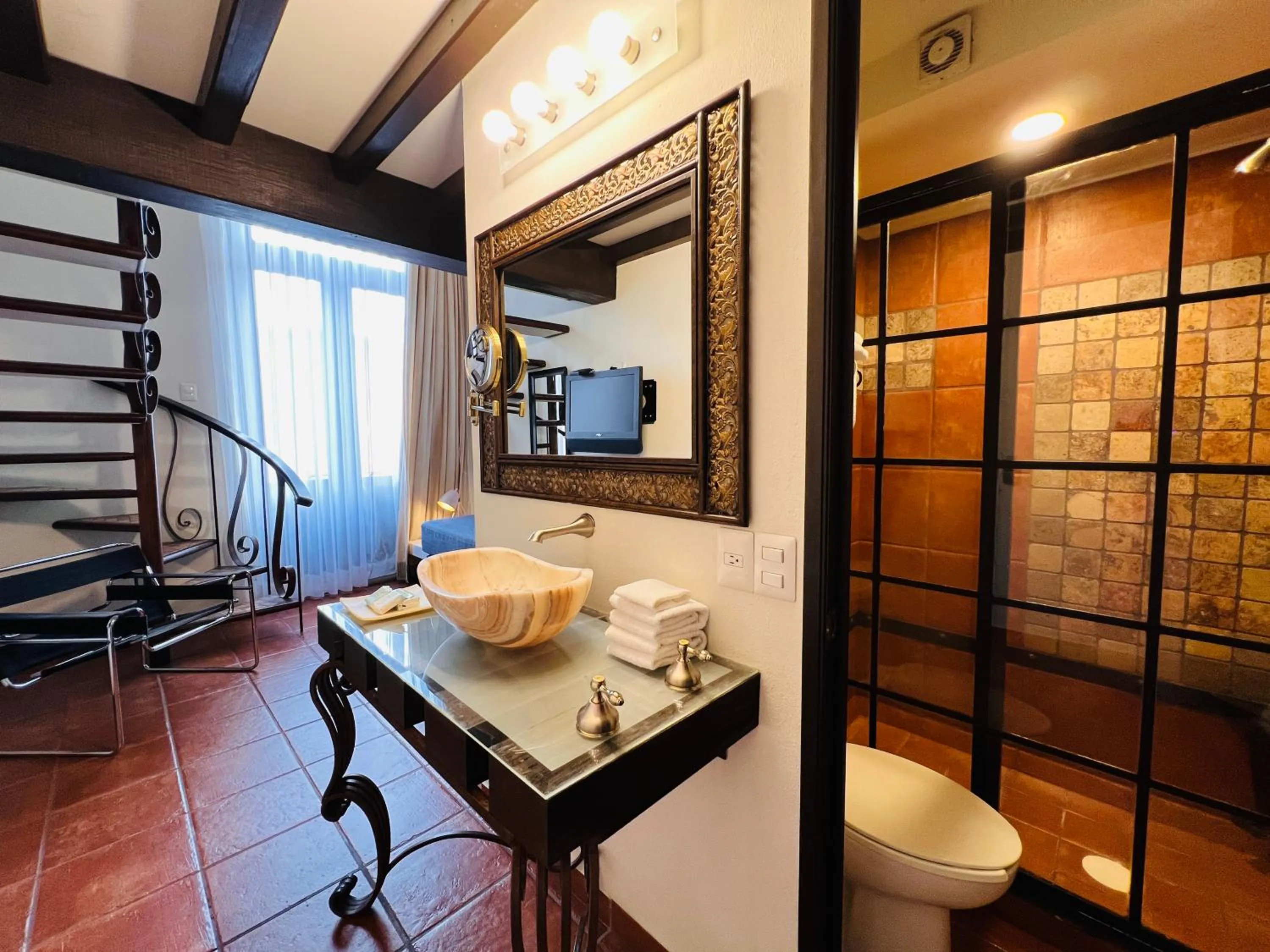 Bathroom in Hotel Herencia By Hosting House