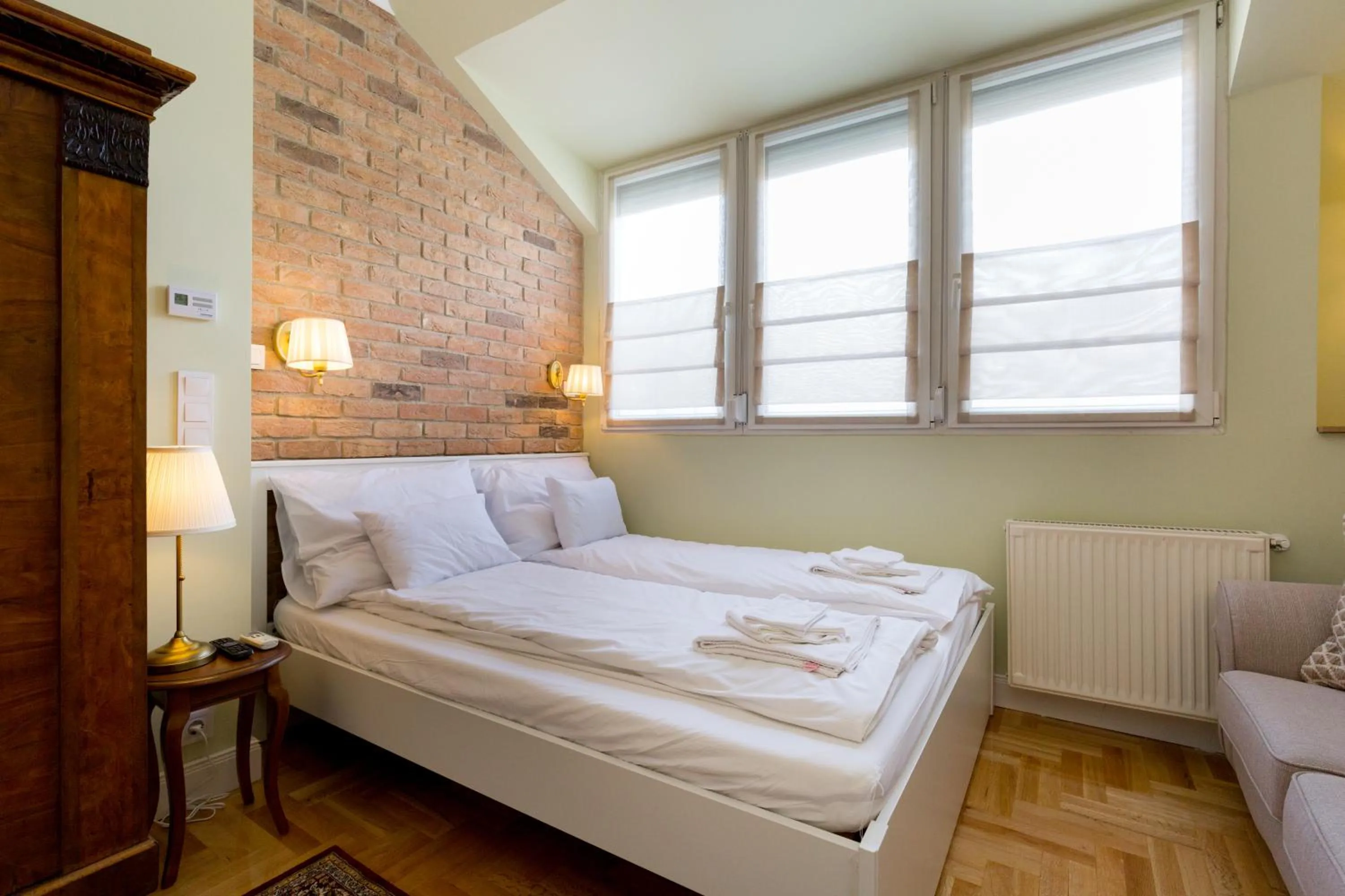 Bed in Roland Apartments