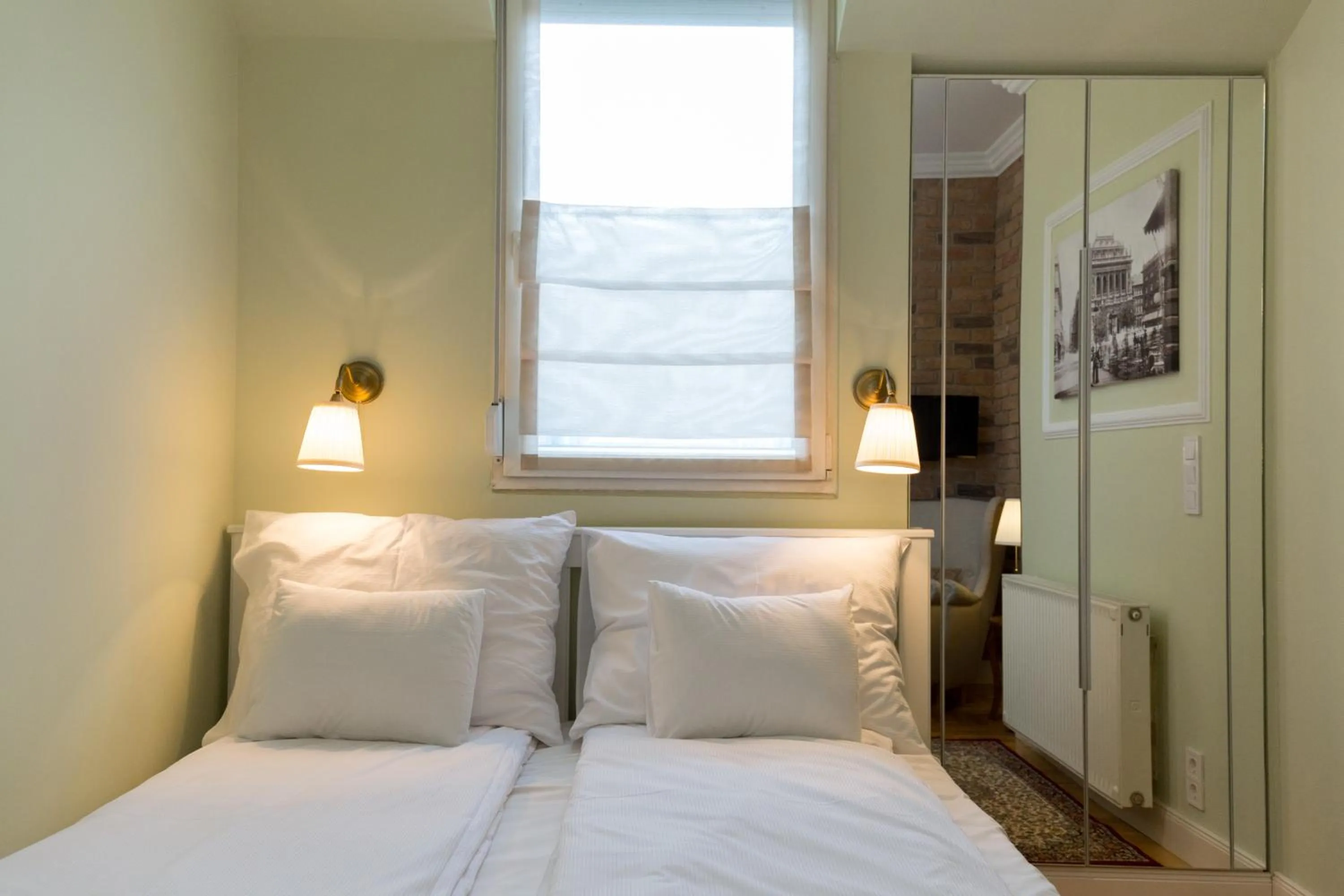 Bed in Roland Apartments