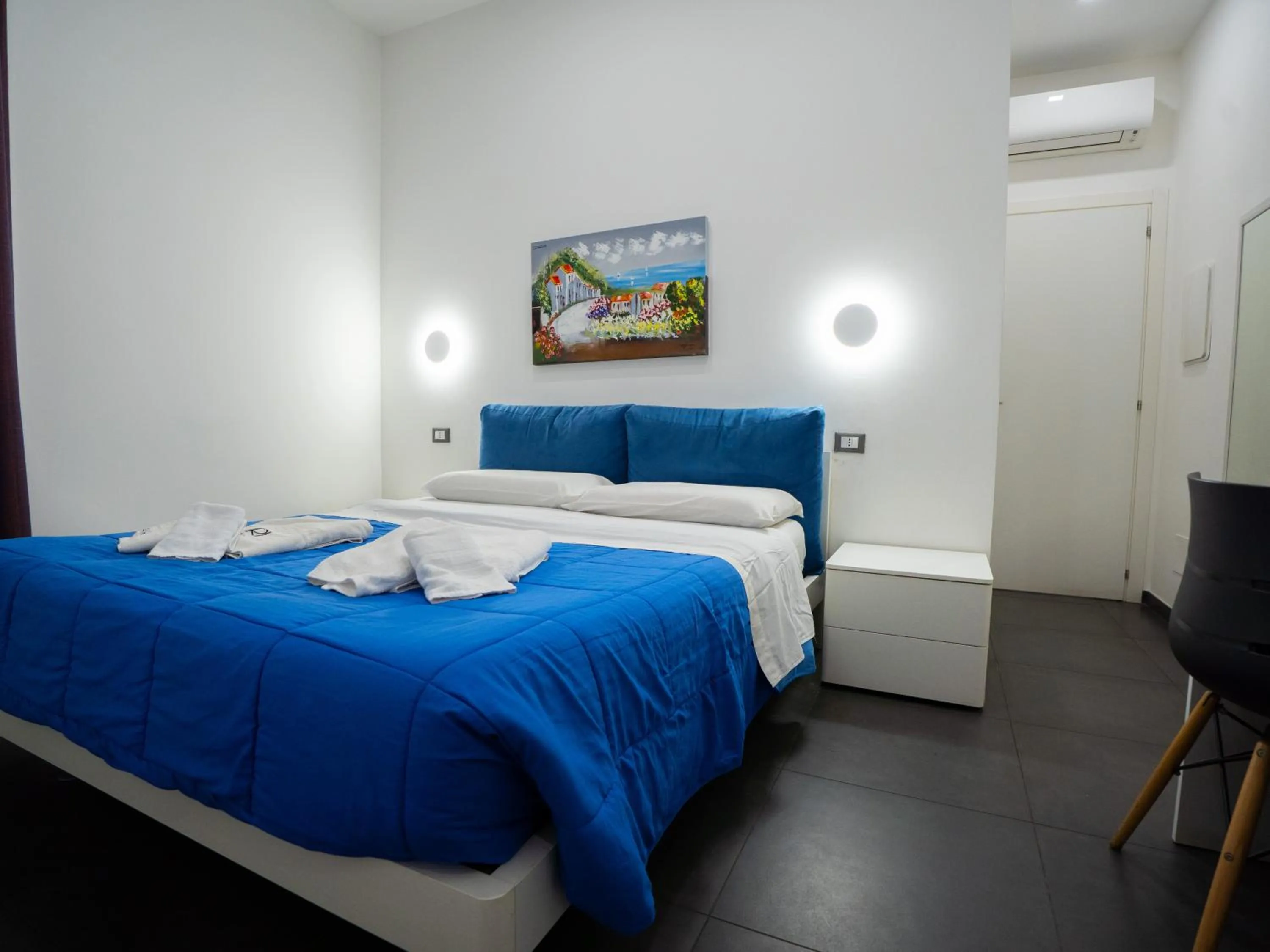 Bed in Amuri Room&Suite