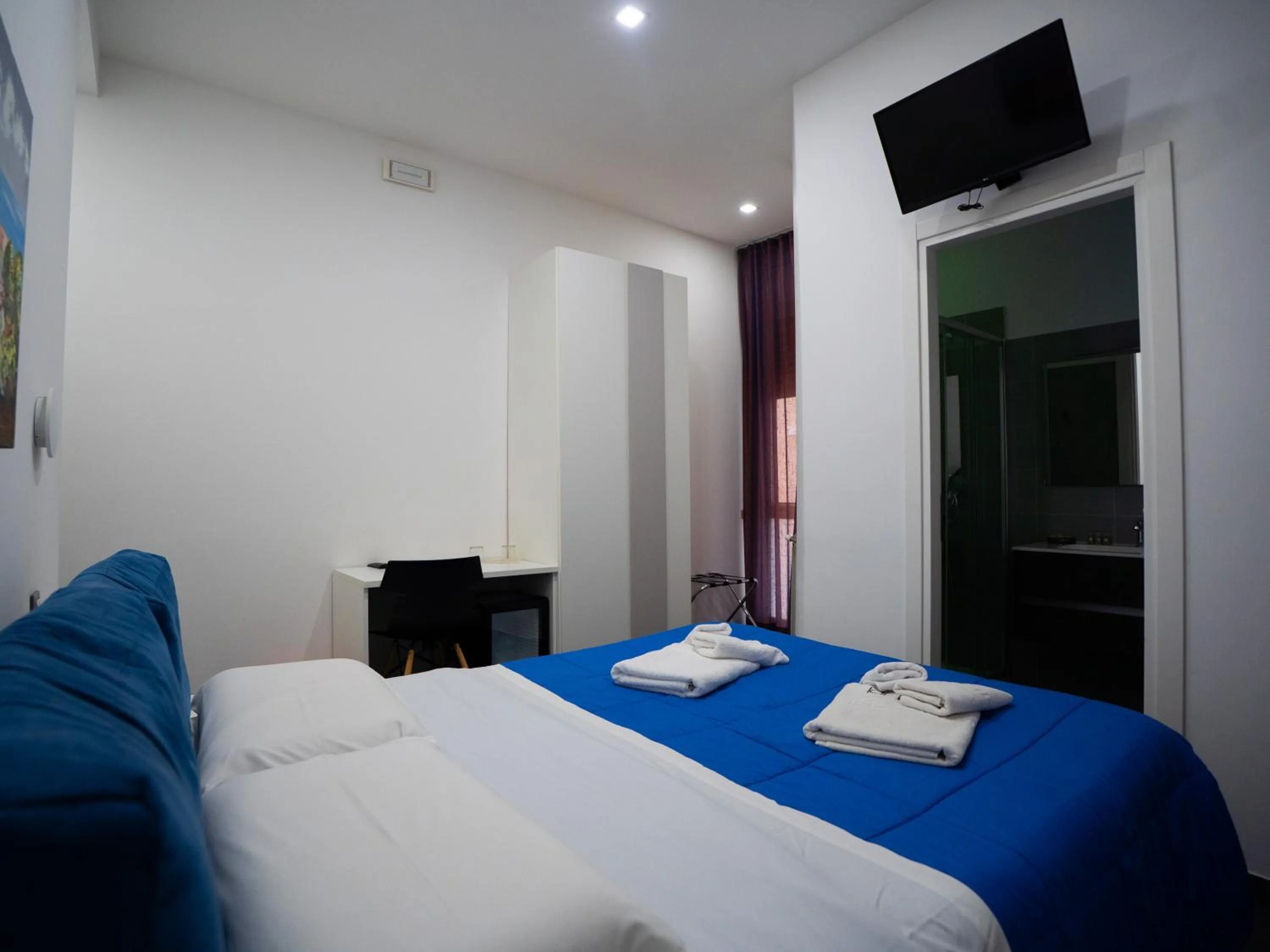 Bed in Amuri Room&Suite