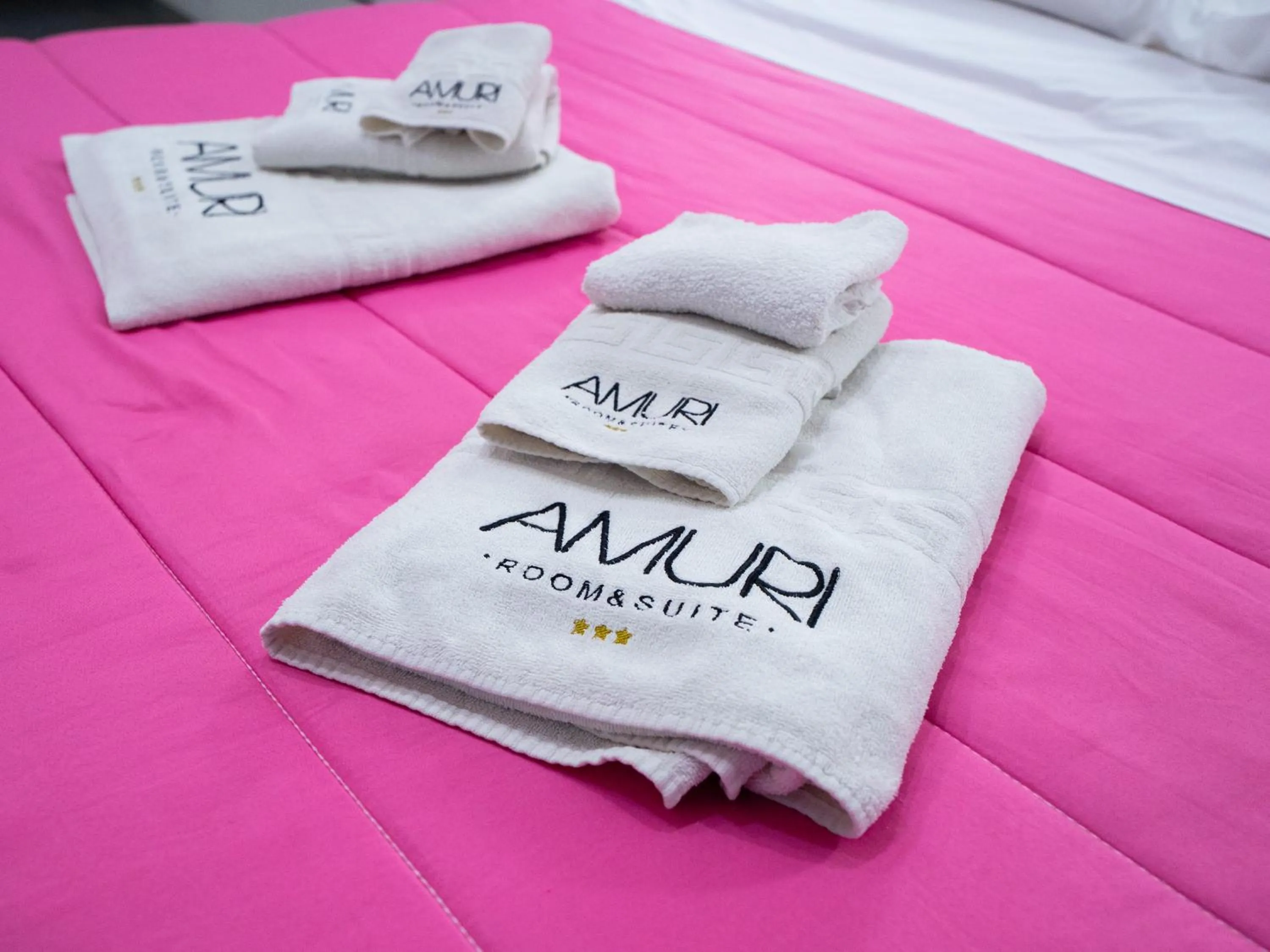 Bed in Amuri Room&Suite