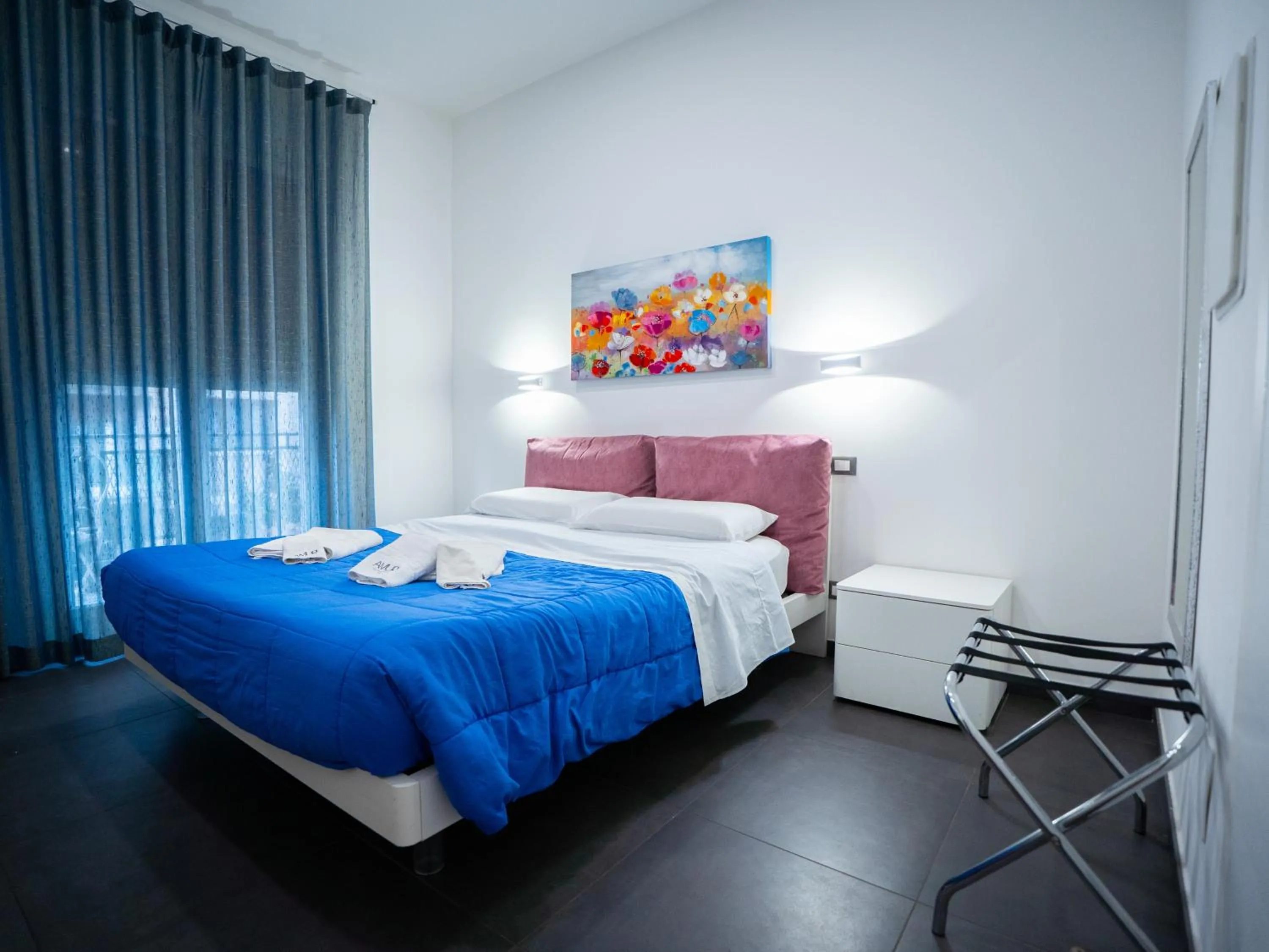 Bed in Amuri Room&Suite