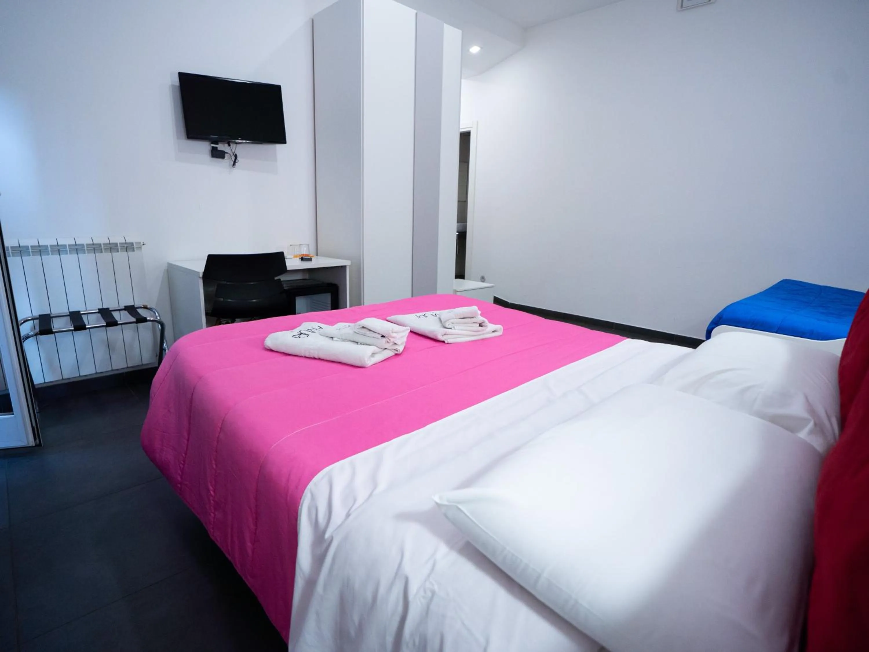 Bed in Amuri Room&Suite