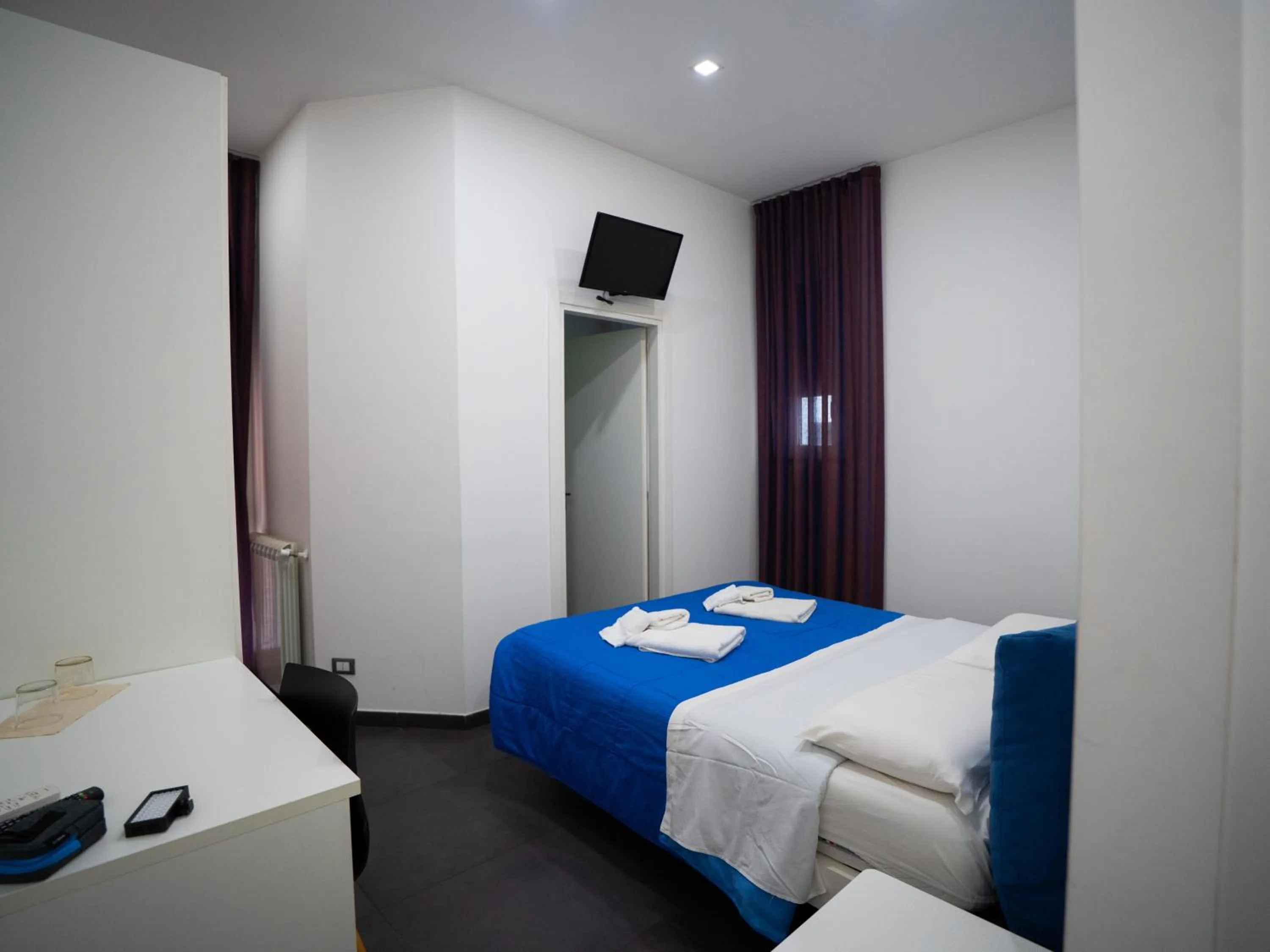 Bed in Amuri Room&Suite