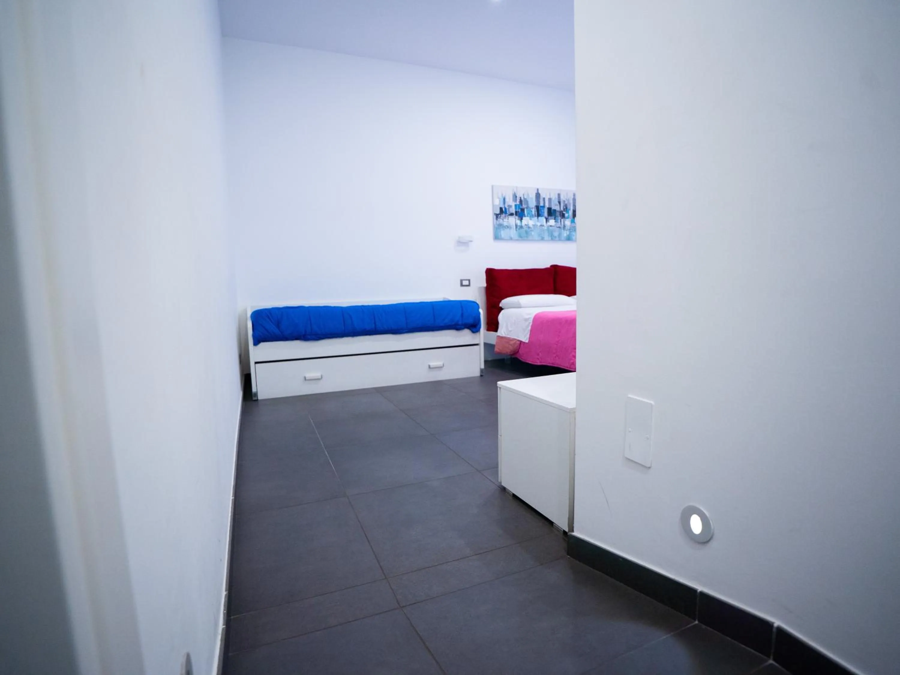 Bed in Amuri Room&Suite