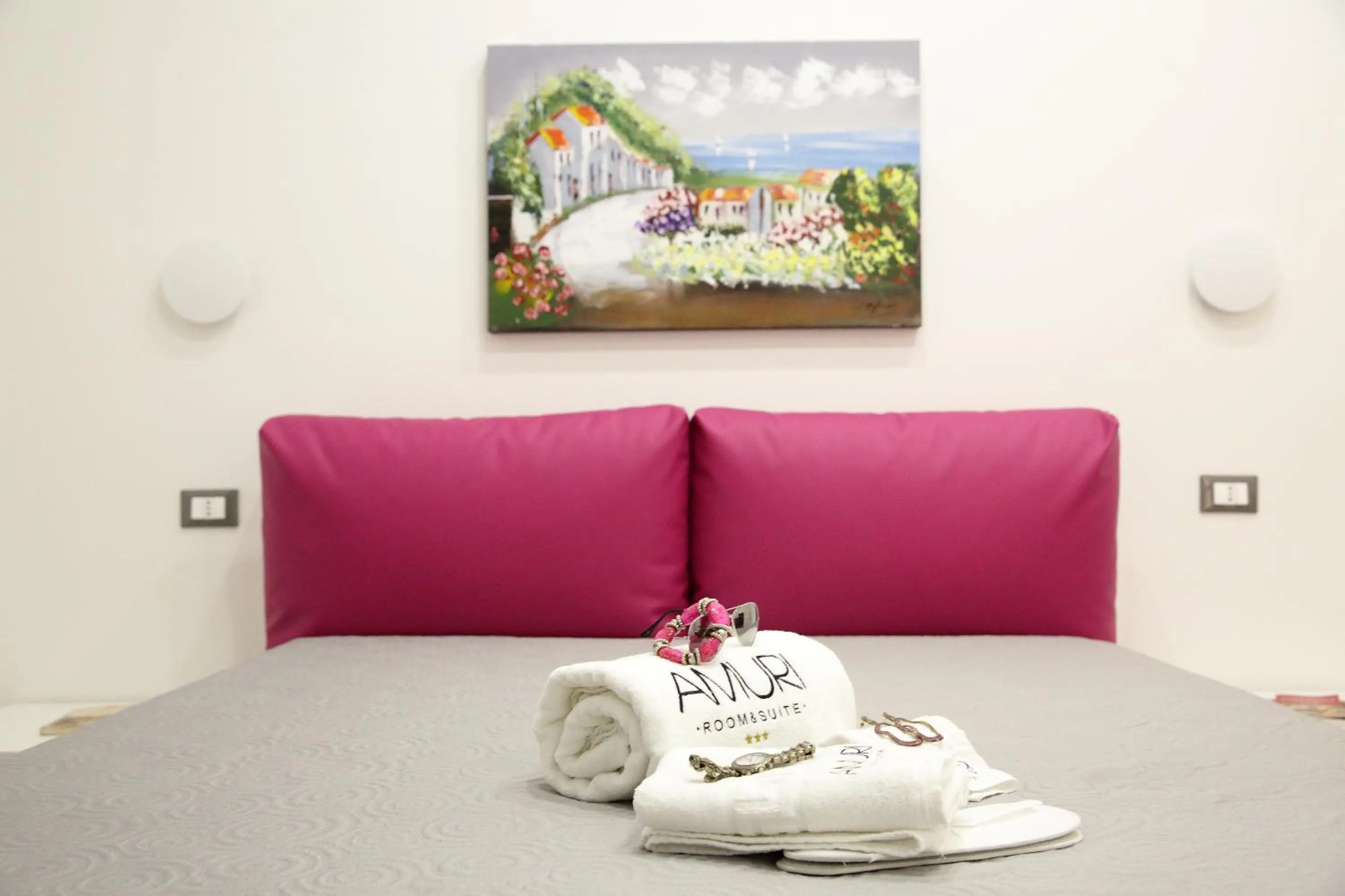 Bed in Amuri Room&Suite