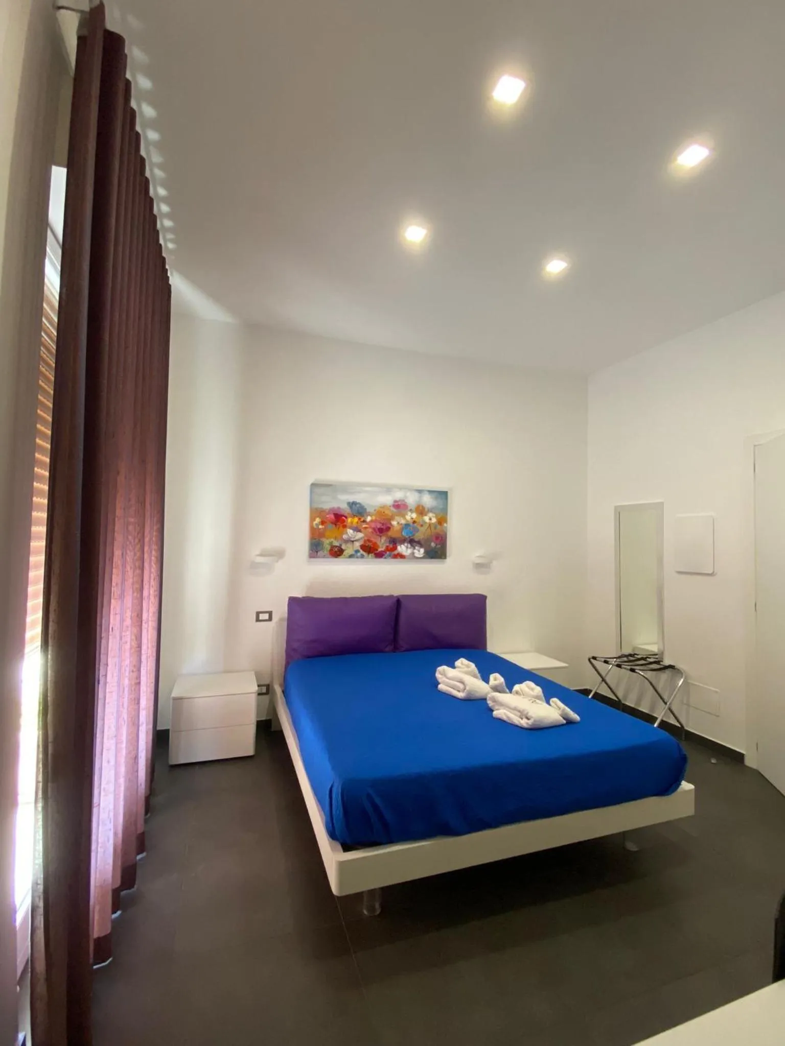 Bed in Amuri Room&Suite