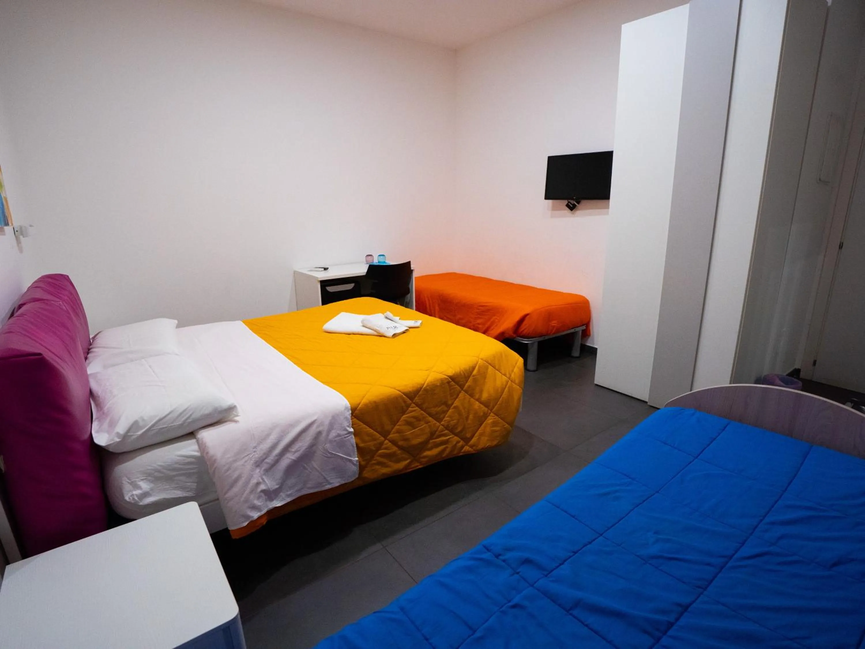 Bed in Amuri Room&Suite