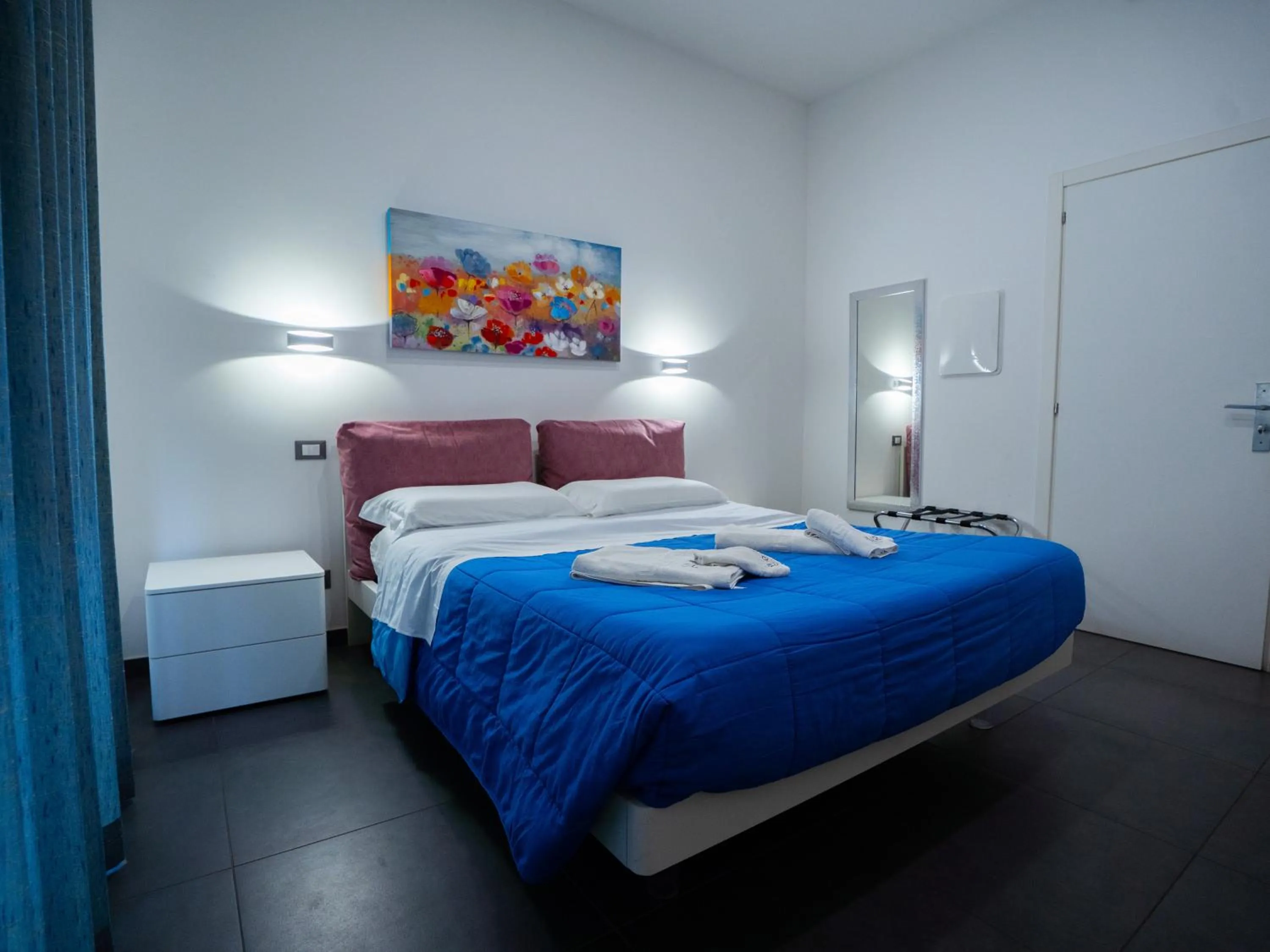 Bed in Amuri Room&Suite