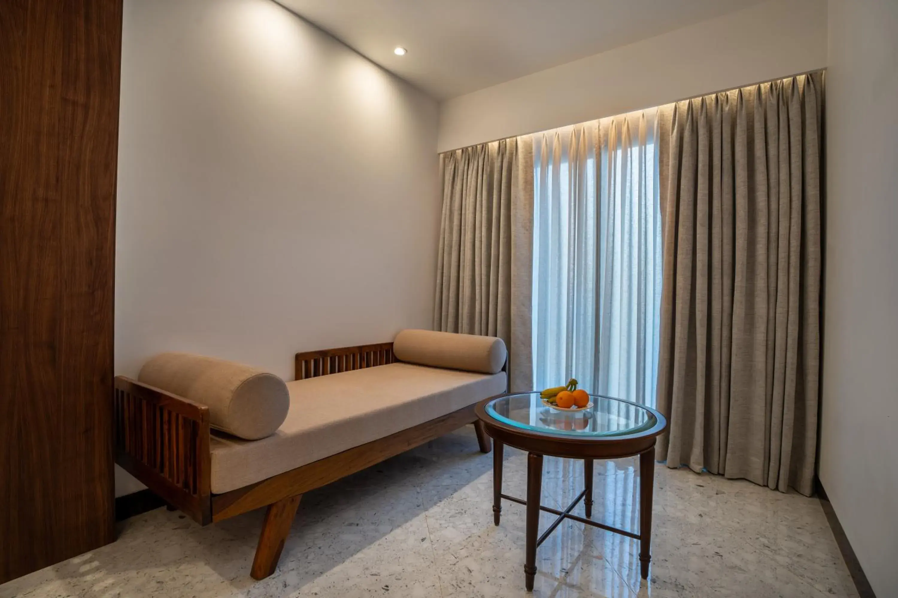 Seating area, Bed in Kenilworth Resort & Spa, Goa Seating area, Bed in Kenilworth Resort & Spa, Goa