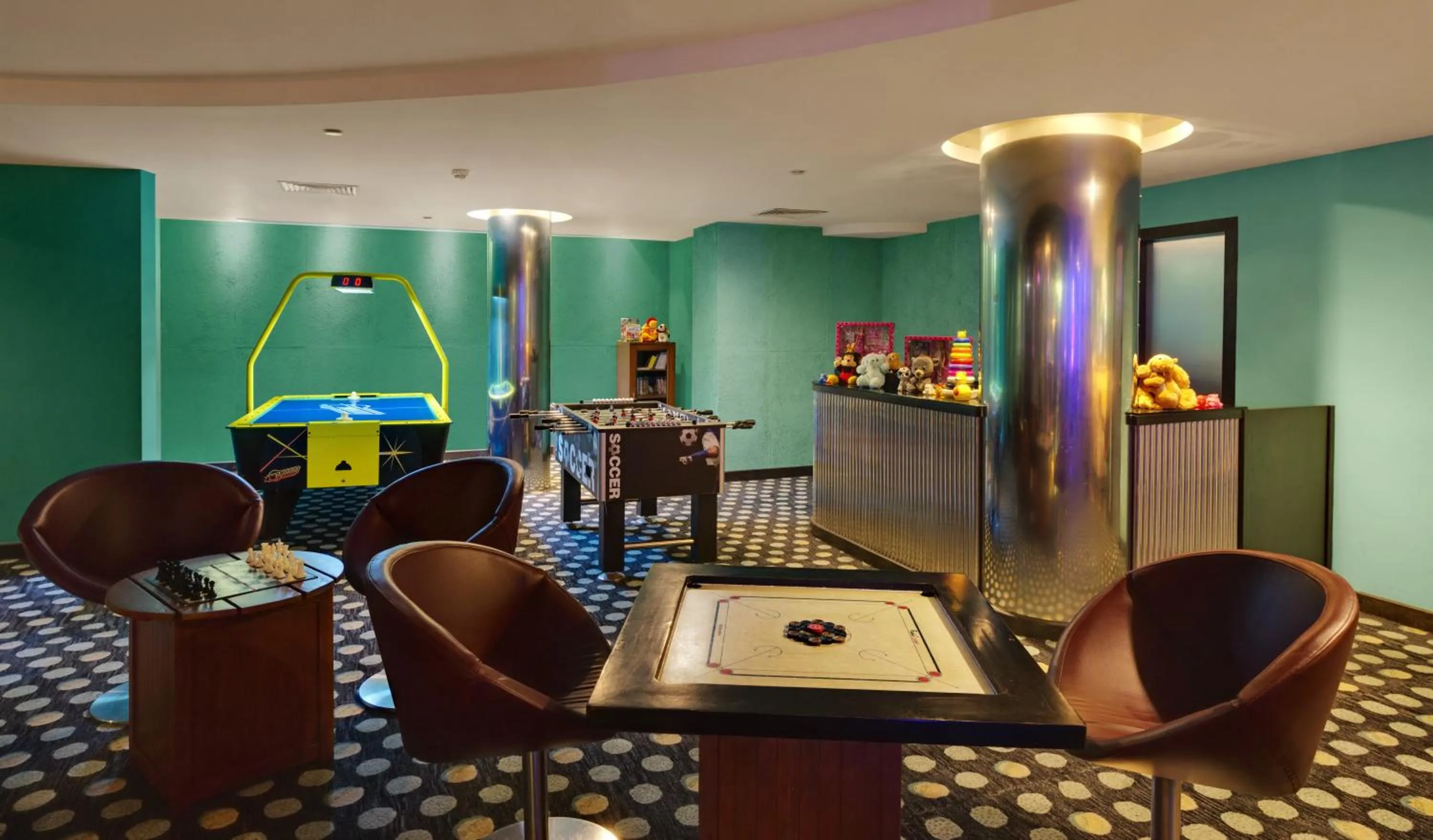 Communal lounge/ TV room in Kenilworth Resort & Spa, Goa