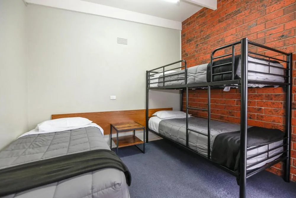 Bed in Abbotswood Motor Inn