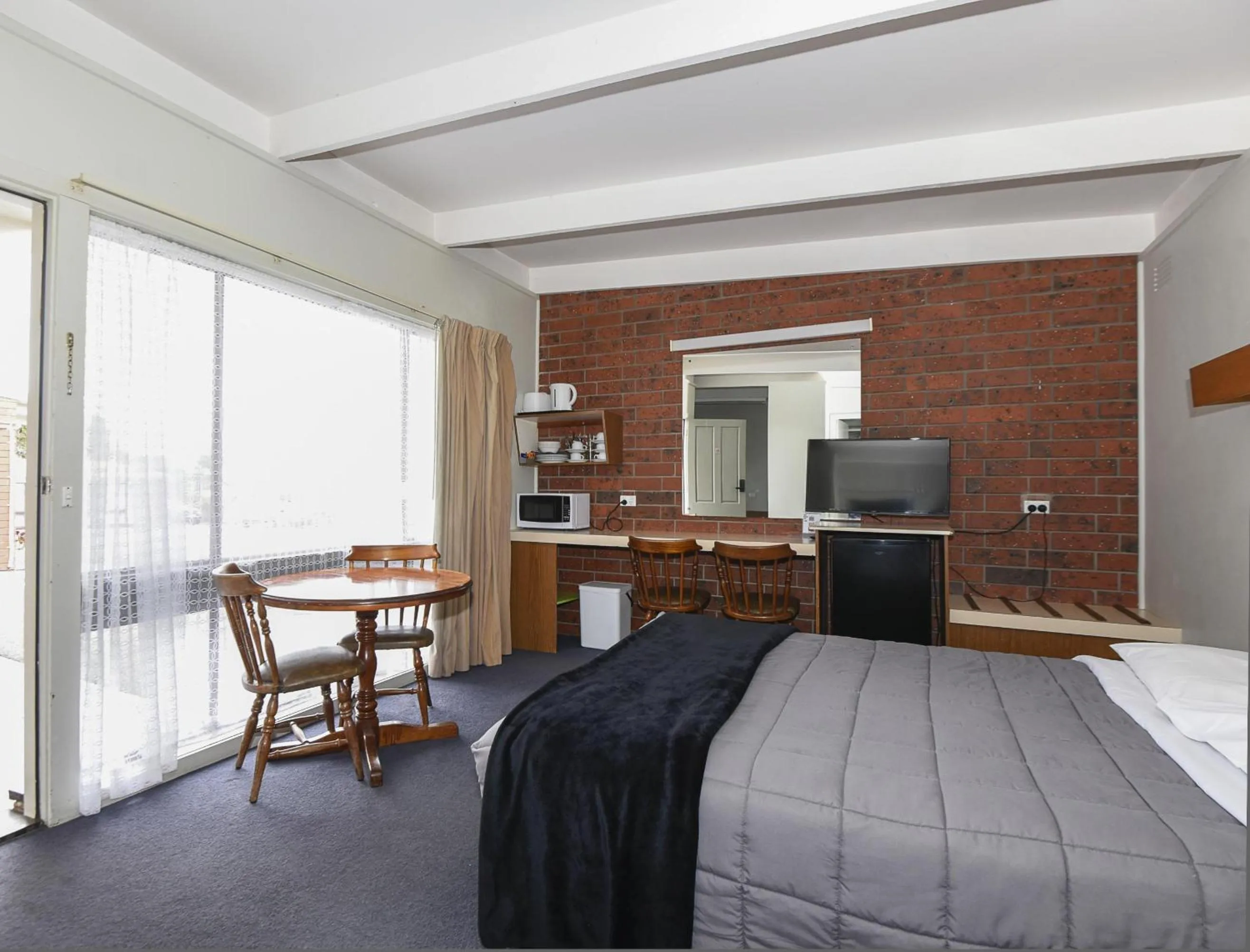 Bed in Abbotswood Motor Inn