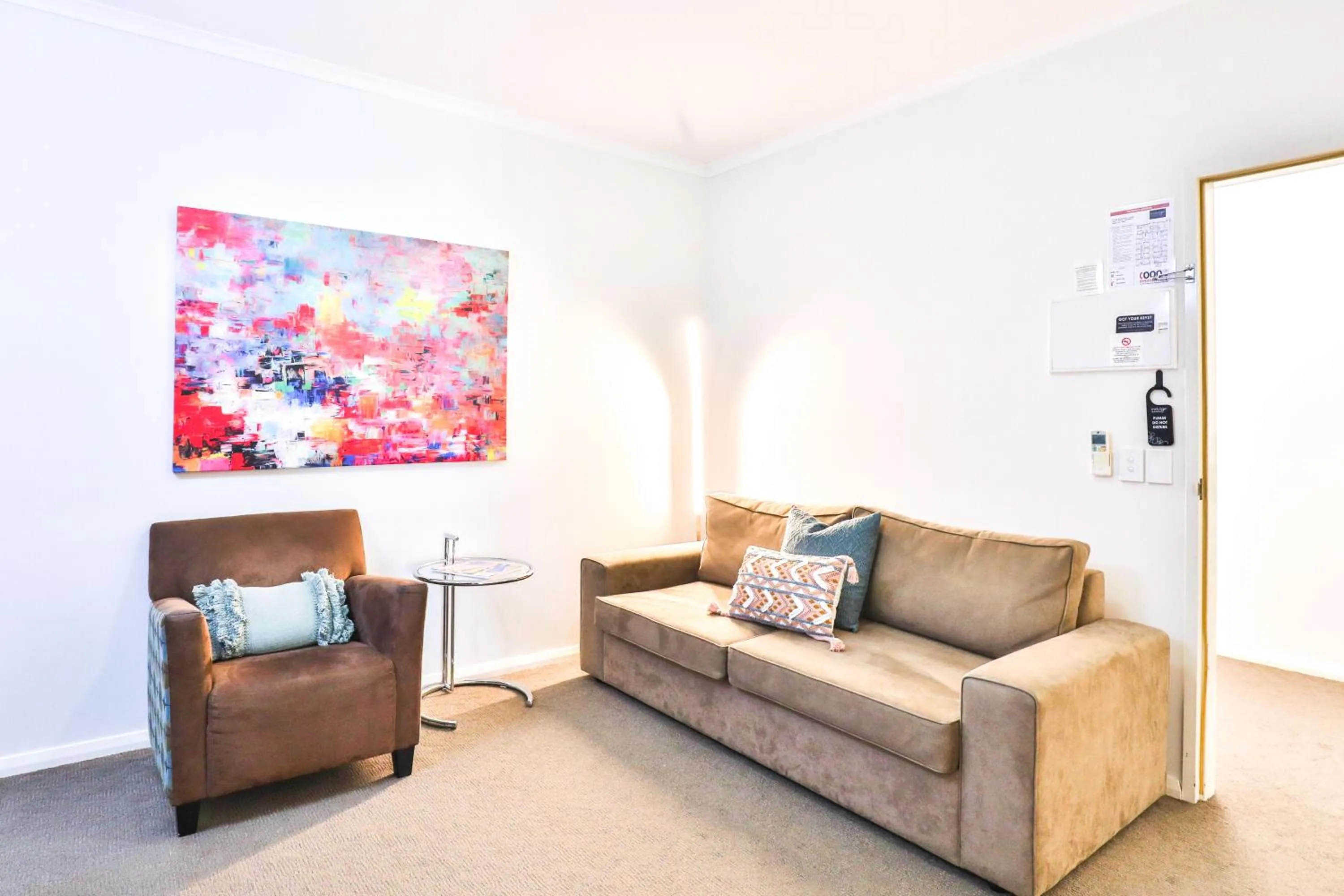 Seating area in Indulge Apartments - Ontario