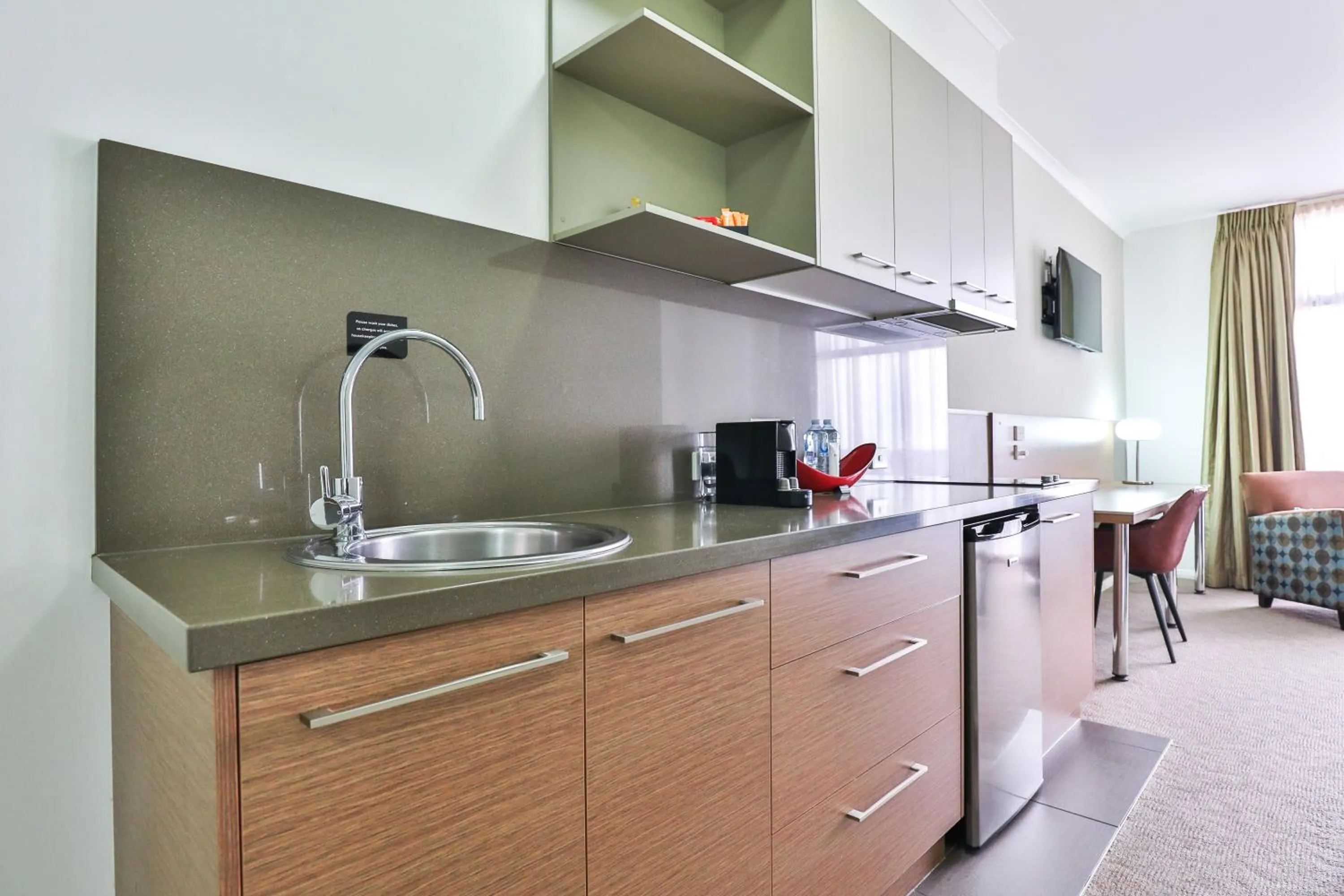 Kitchen or kitchenette in Indulge Apartments - Ontario
