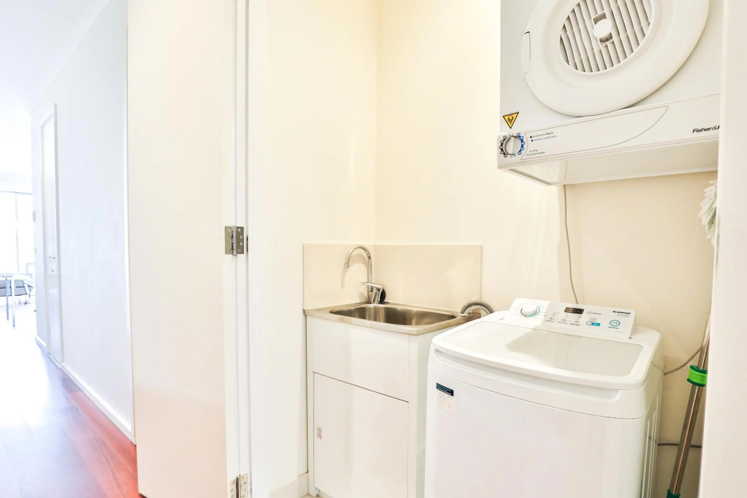 washing machine in Indulge Apartments - Langtree