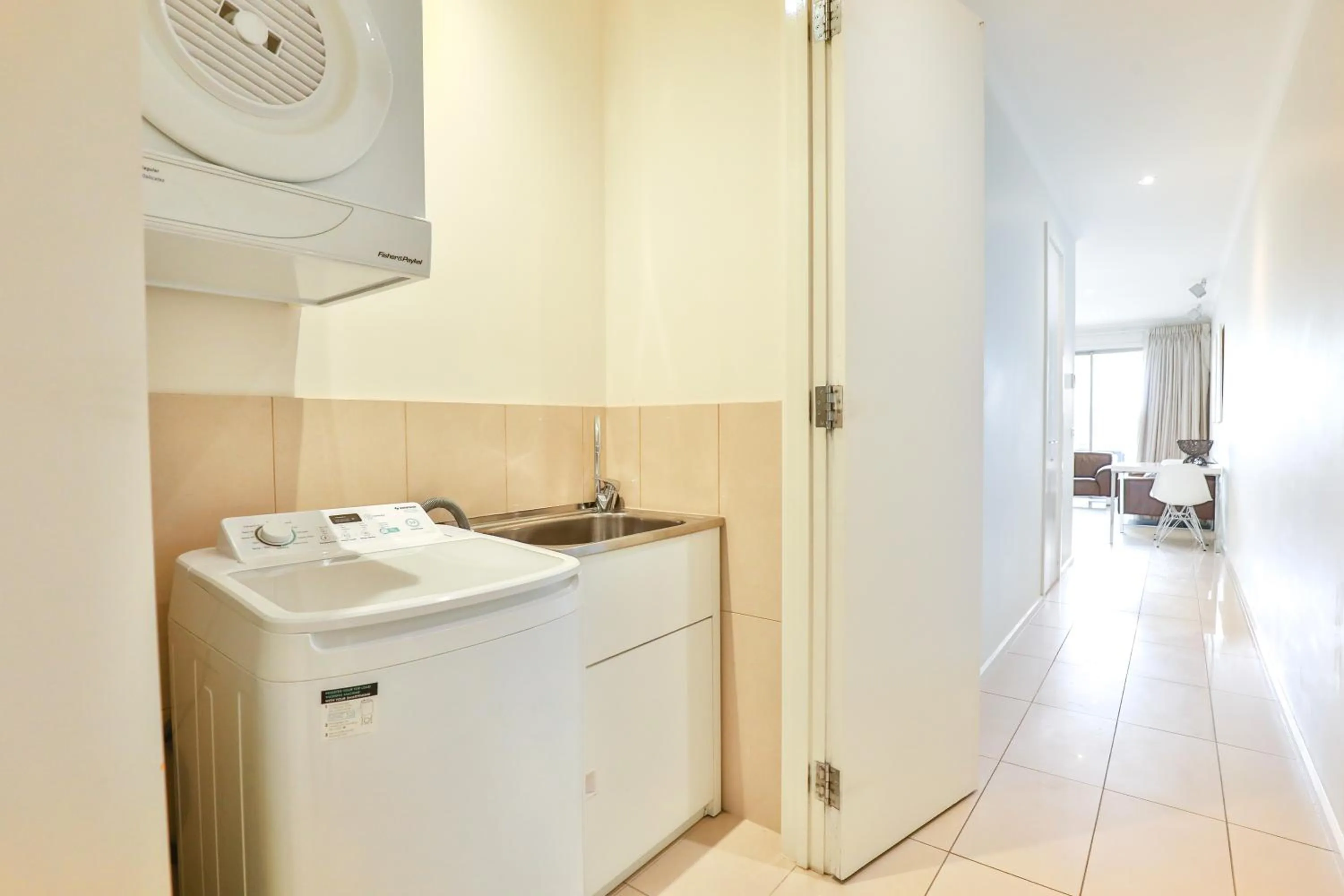 washing machine in Indulge Apartments - Langtree