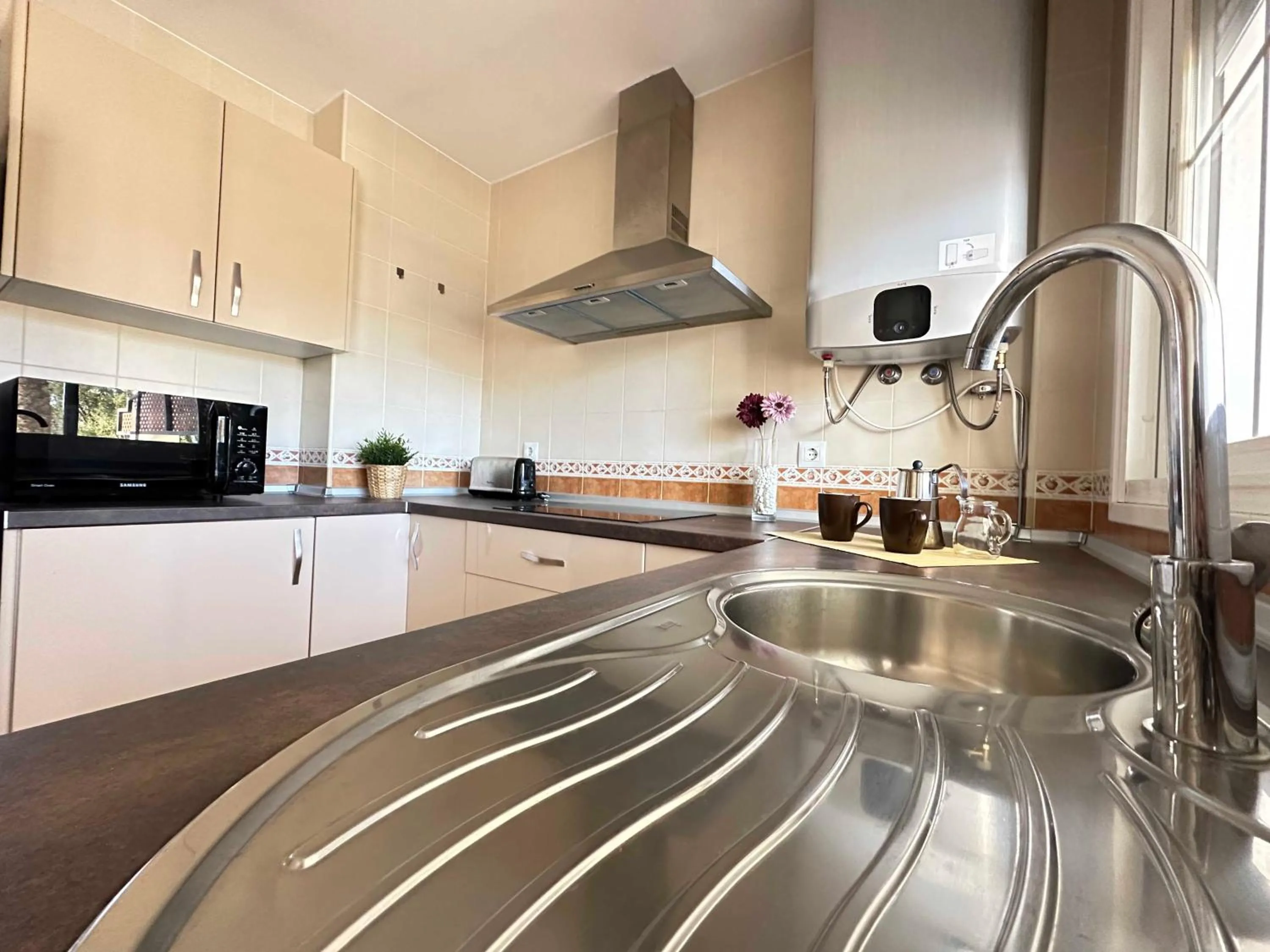 Kitchen or kitchenette in Taymar