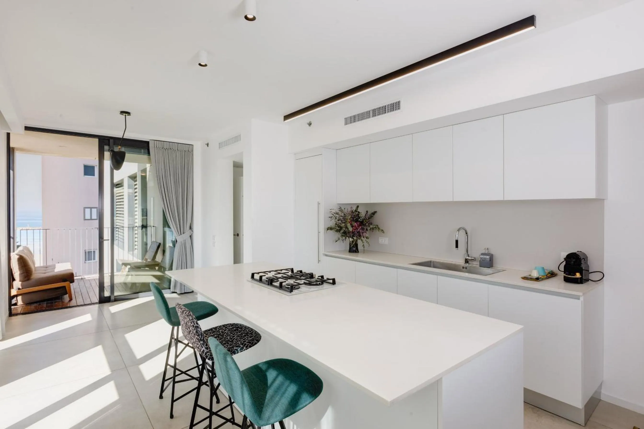 kitchen in Renoma Apartments