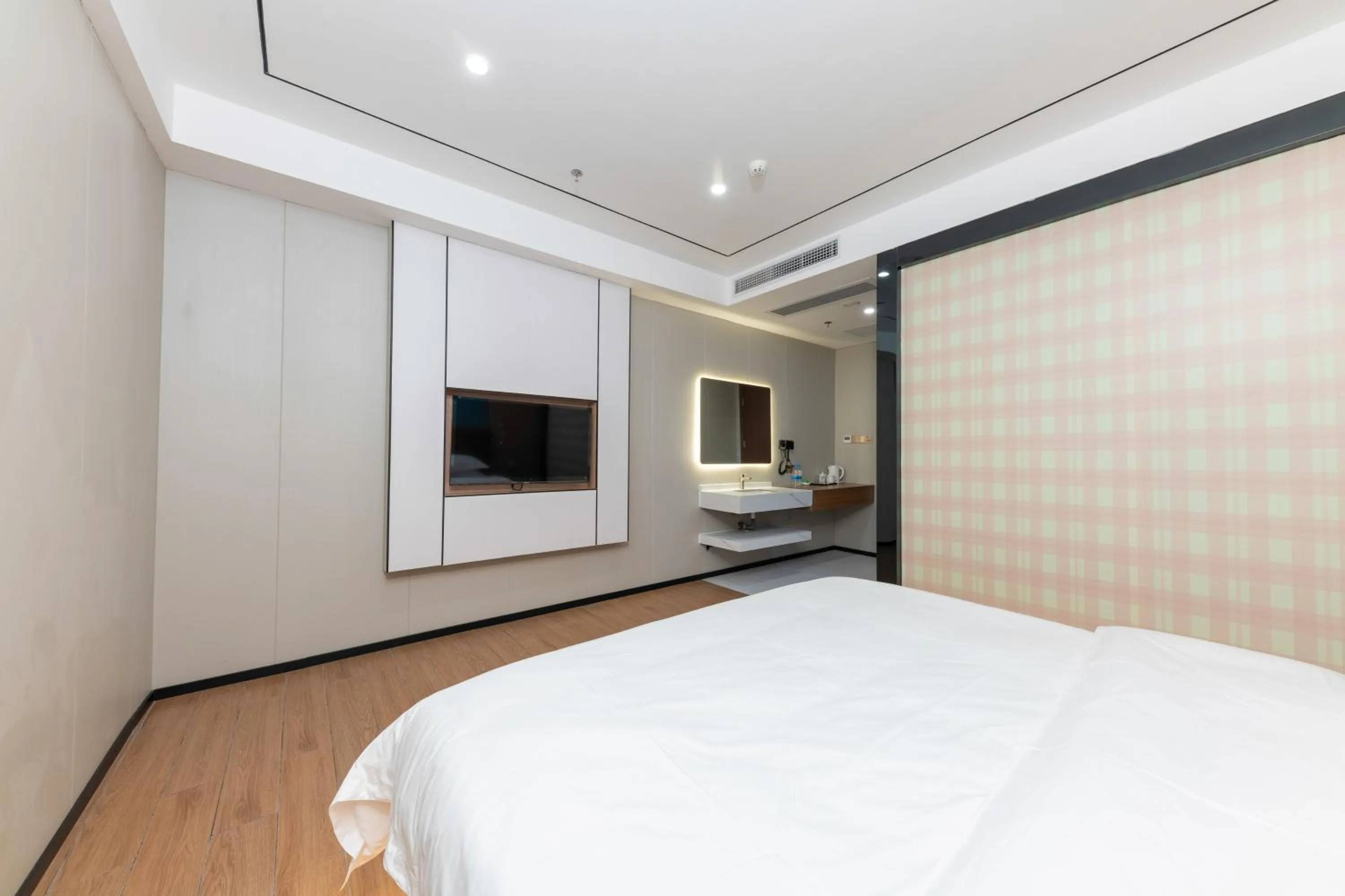 Communal lounge/ TV room in Guangzhou Haiyue Hotel