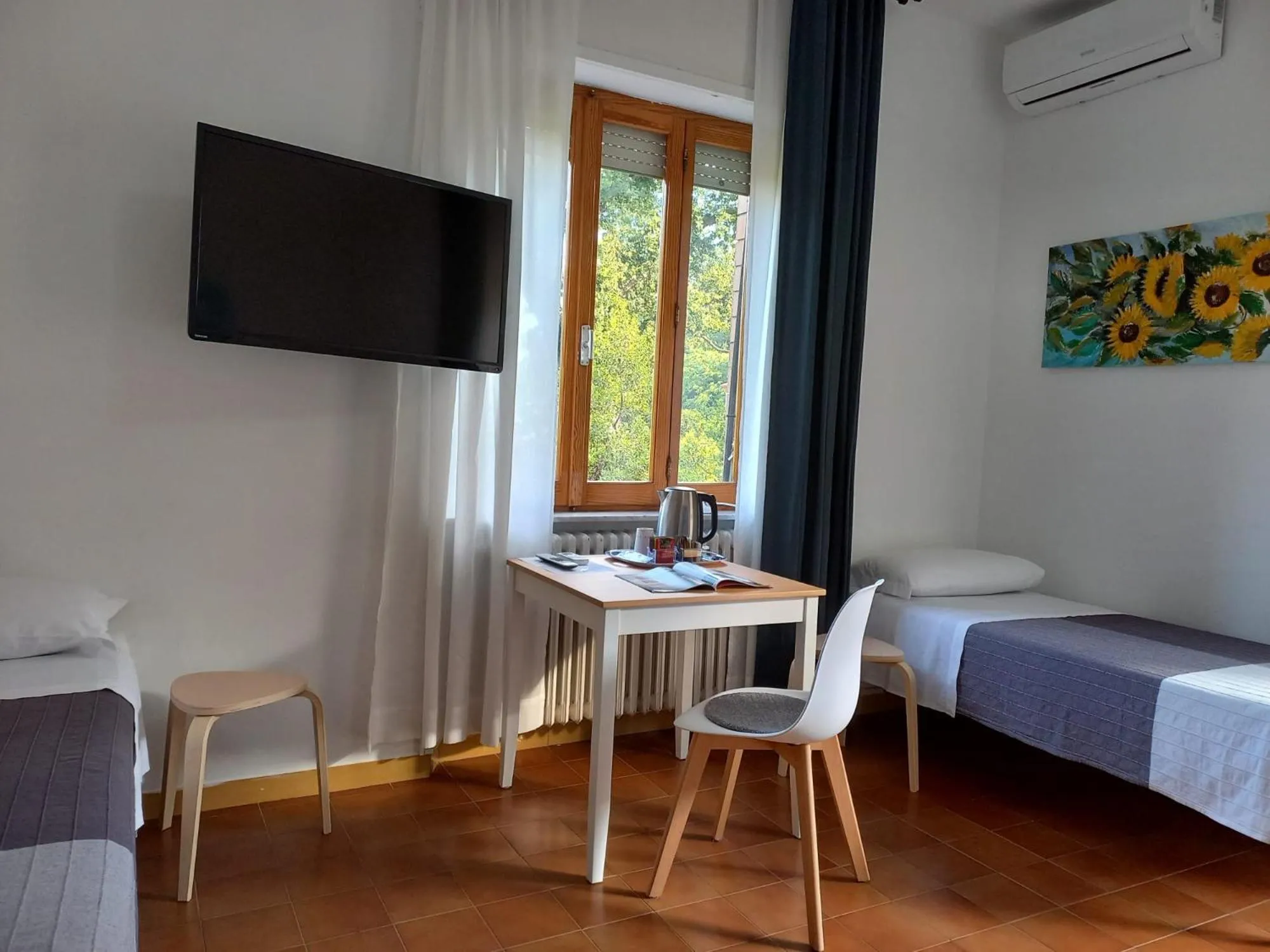 Bed in Hotel Cormorano