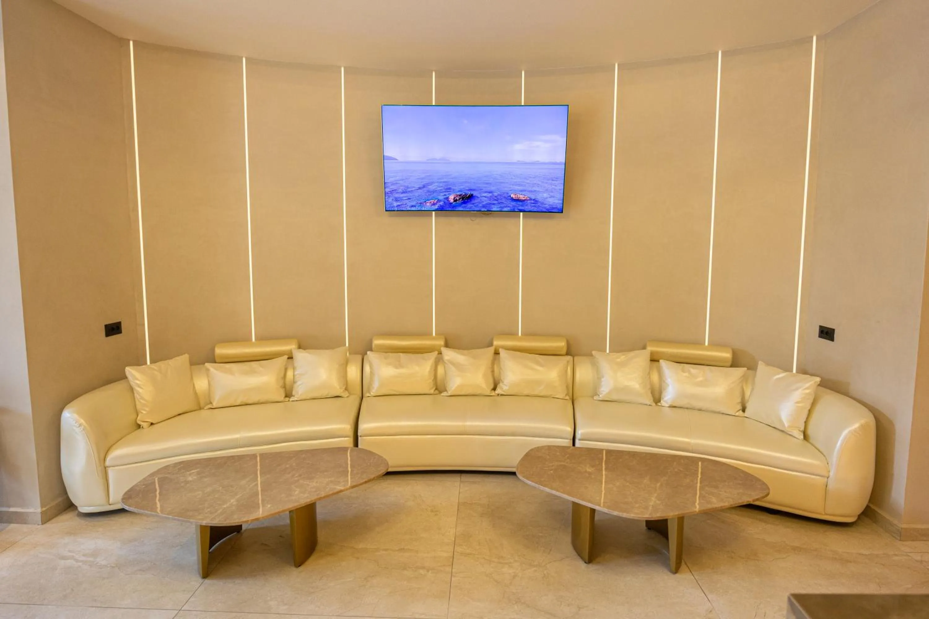 Communal lounge/ TV room in Sky Hotel Tirana