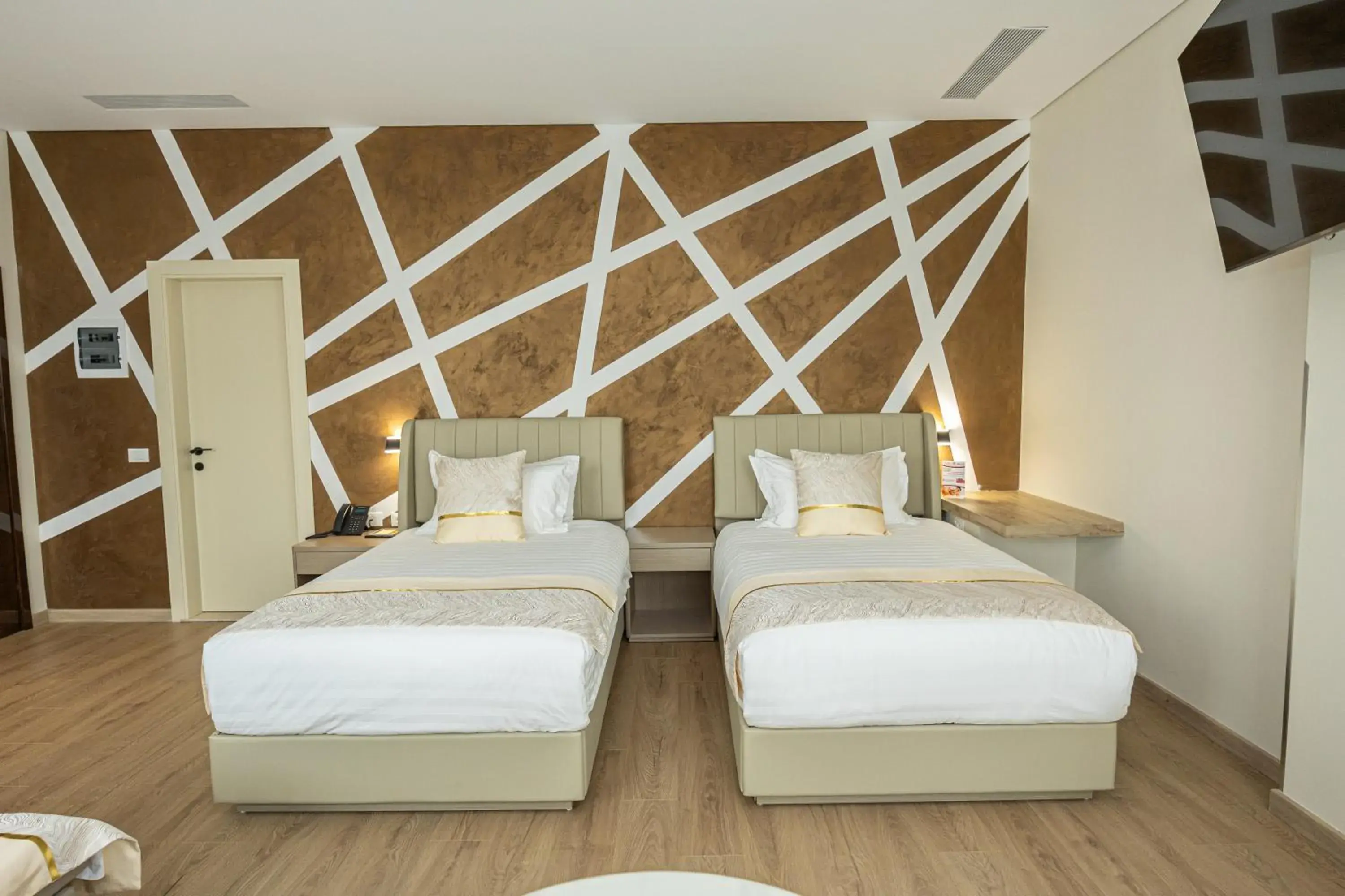 Communal lounge/ TV room, Bed in Sky Hotel Tirana Communal lounge/ TV room, Bed in Sky Hotel Tirana