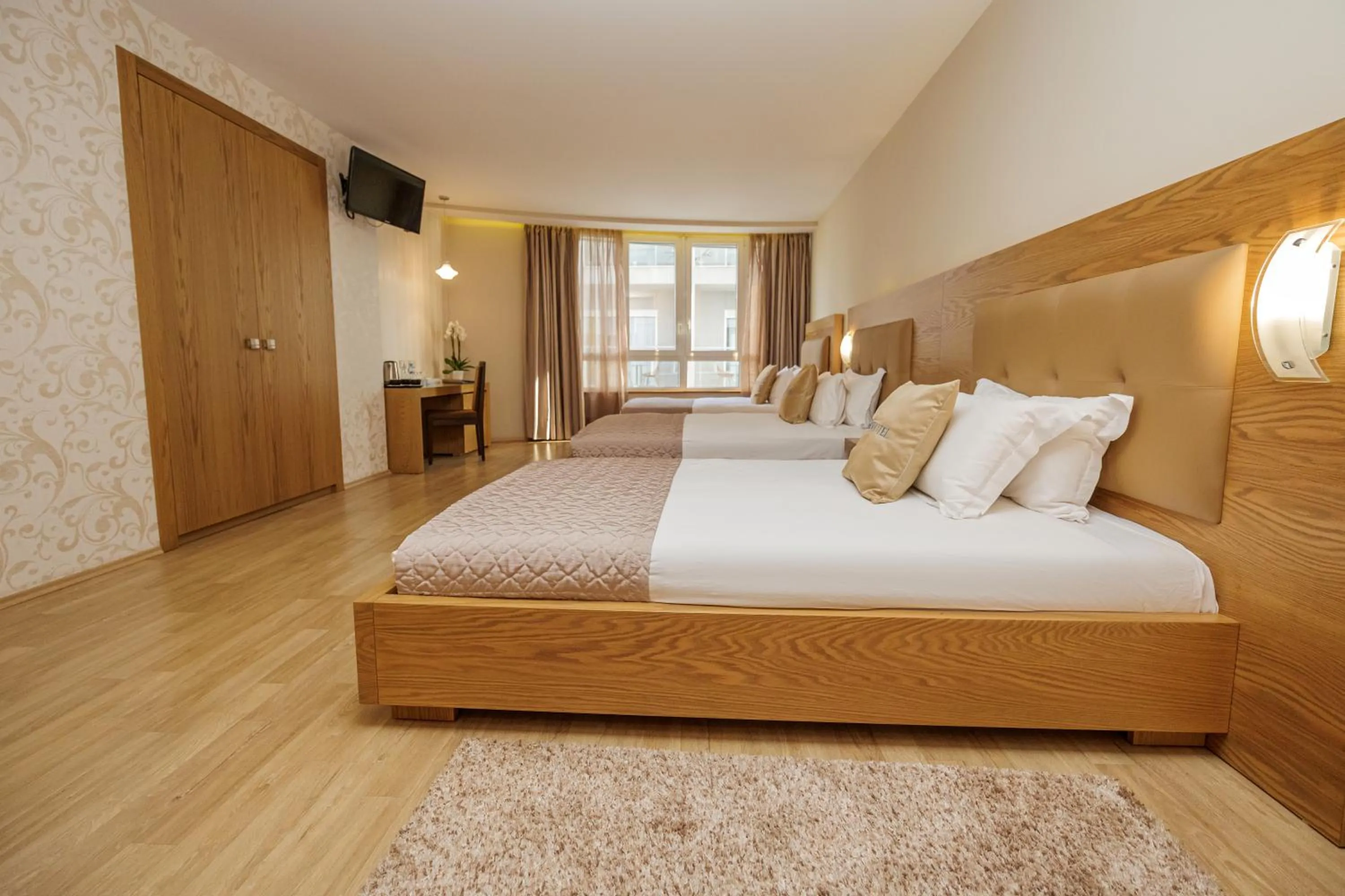 Communal lounge/ TV room, Bed in Sky Hotel Tirana