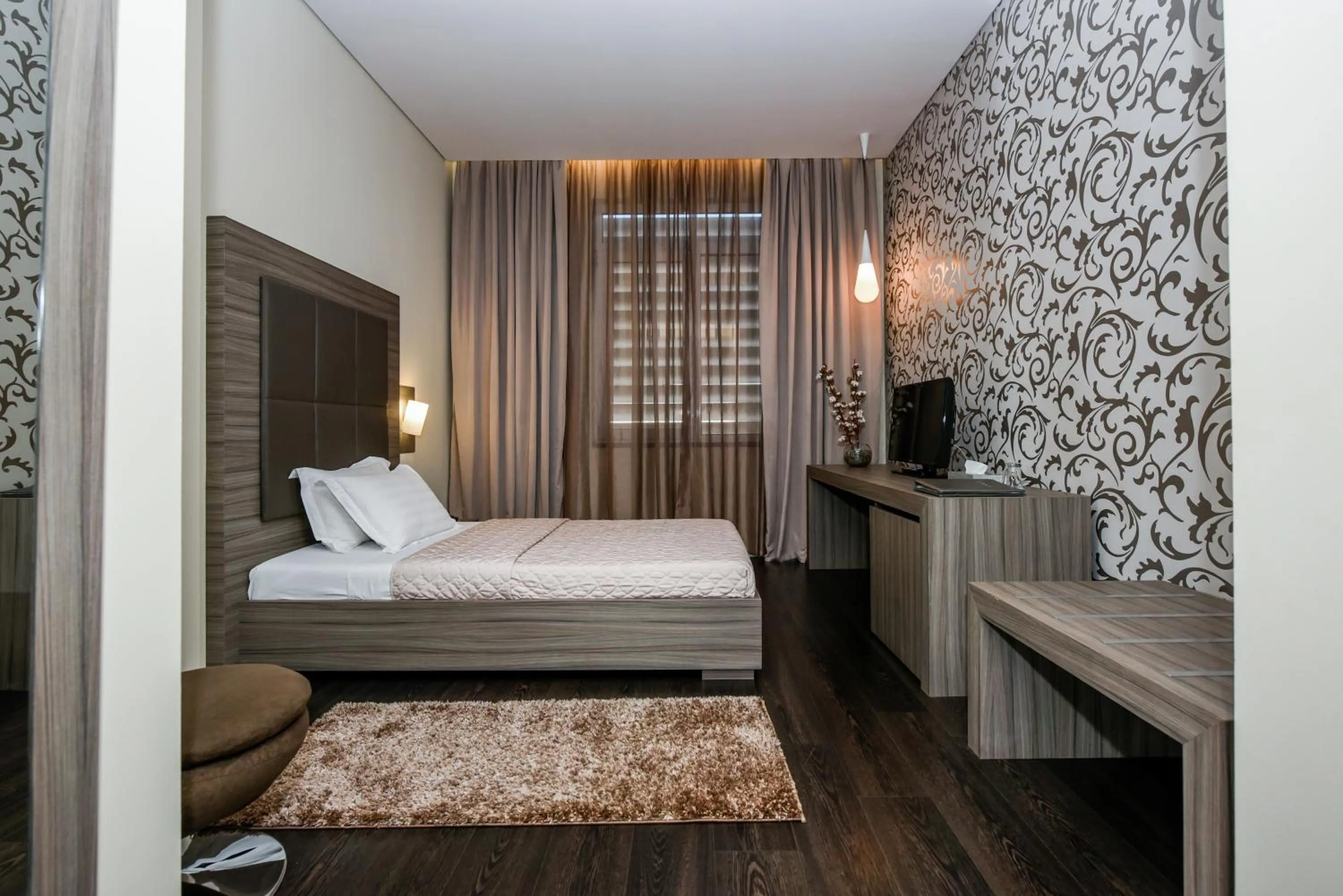 Communal lounge/ TV room, Bed in Sky Hotel Tirana