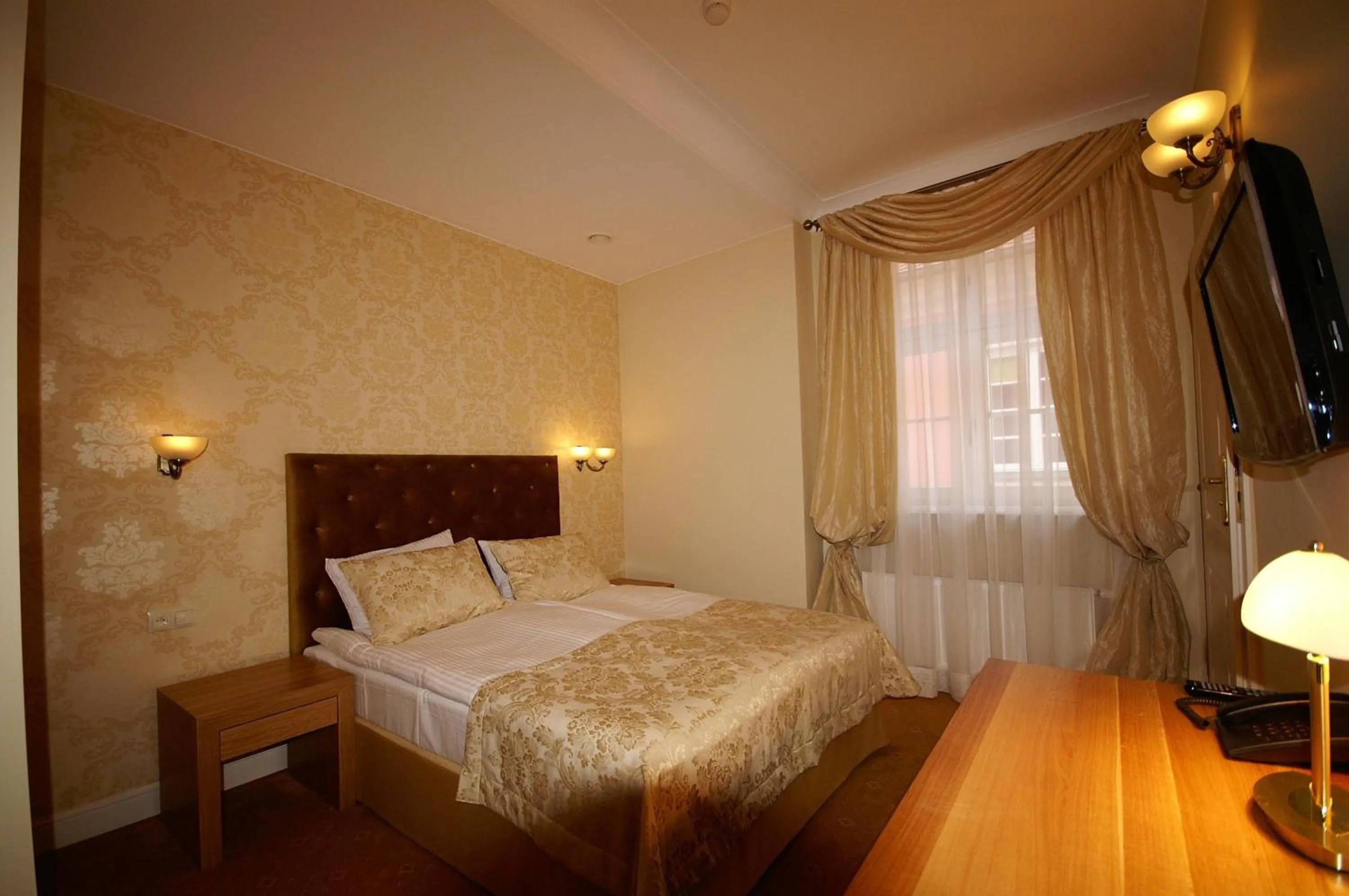 Bed in Hotel Kolegiacki