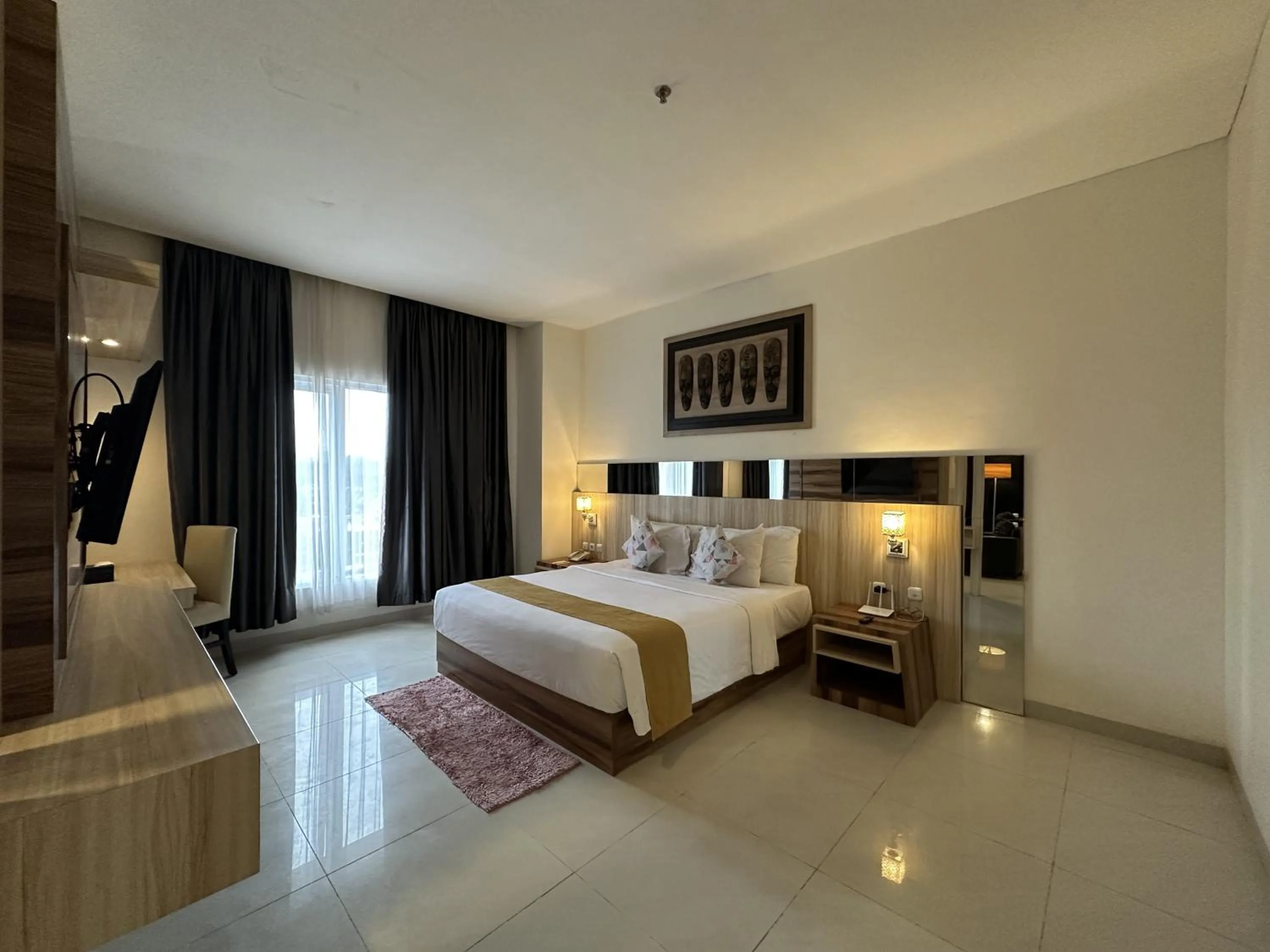 Bed in Vega Prime Hotel & Convention