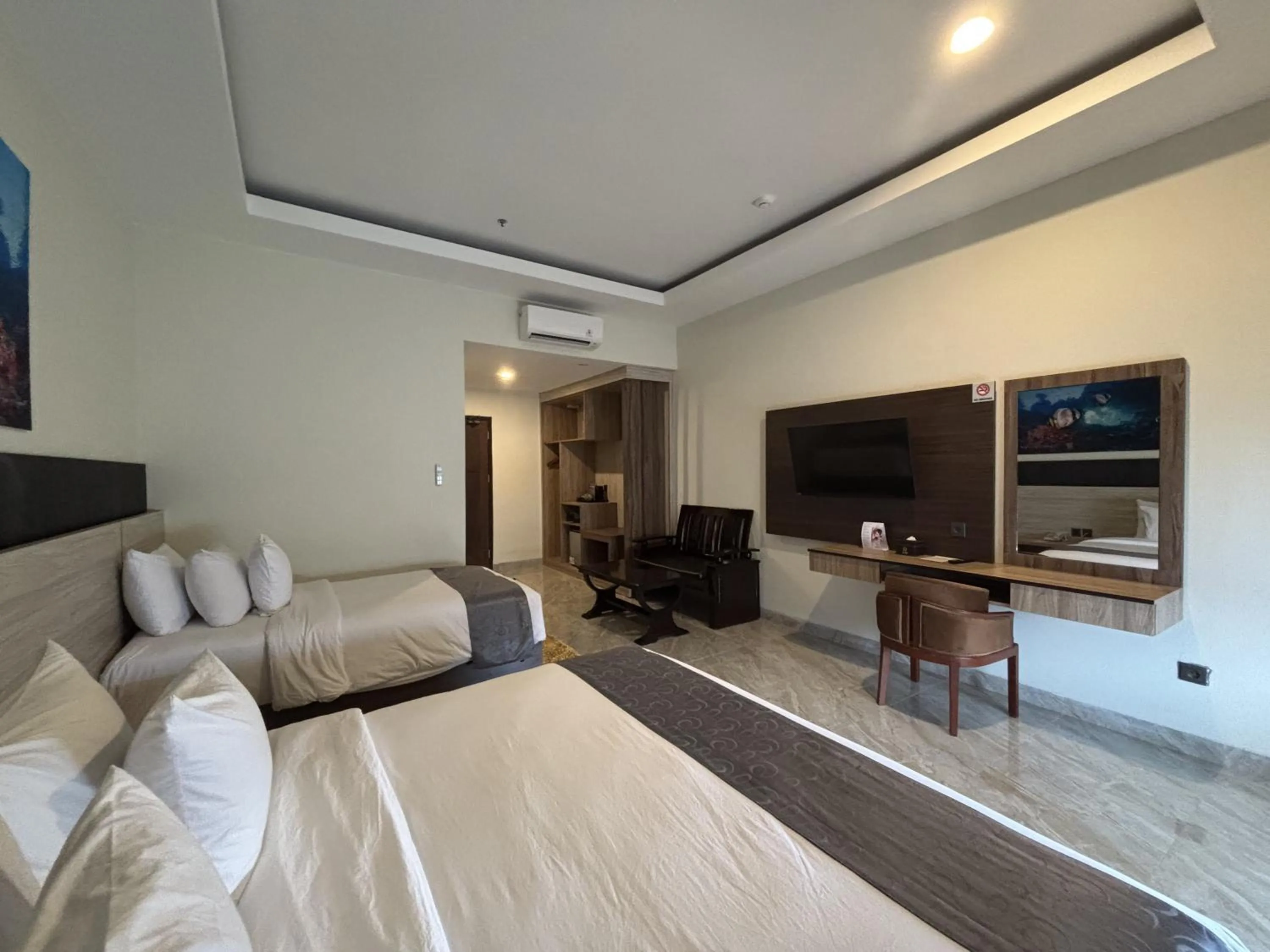 Bed in Vega Prime Hotel & Convention