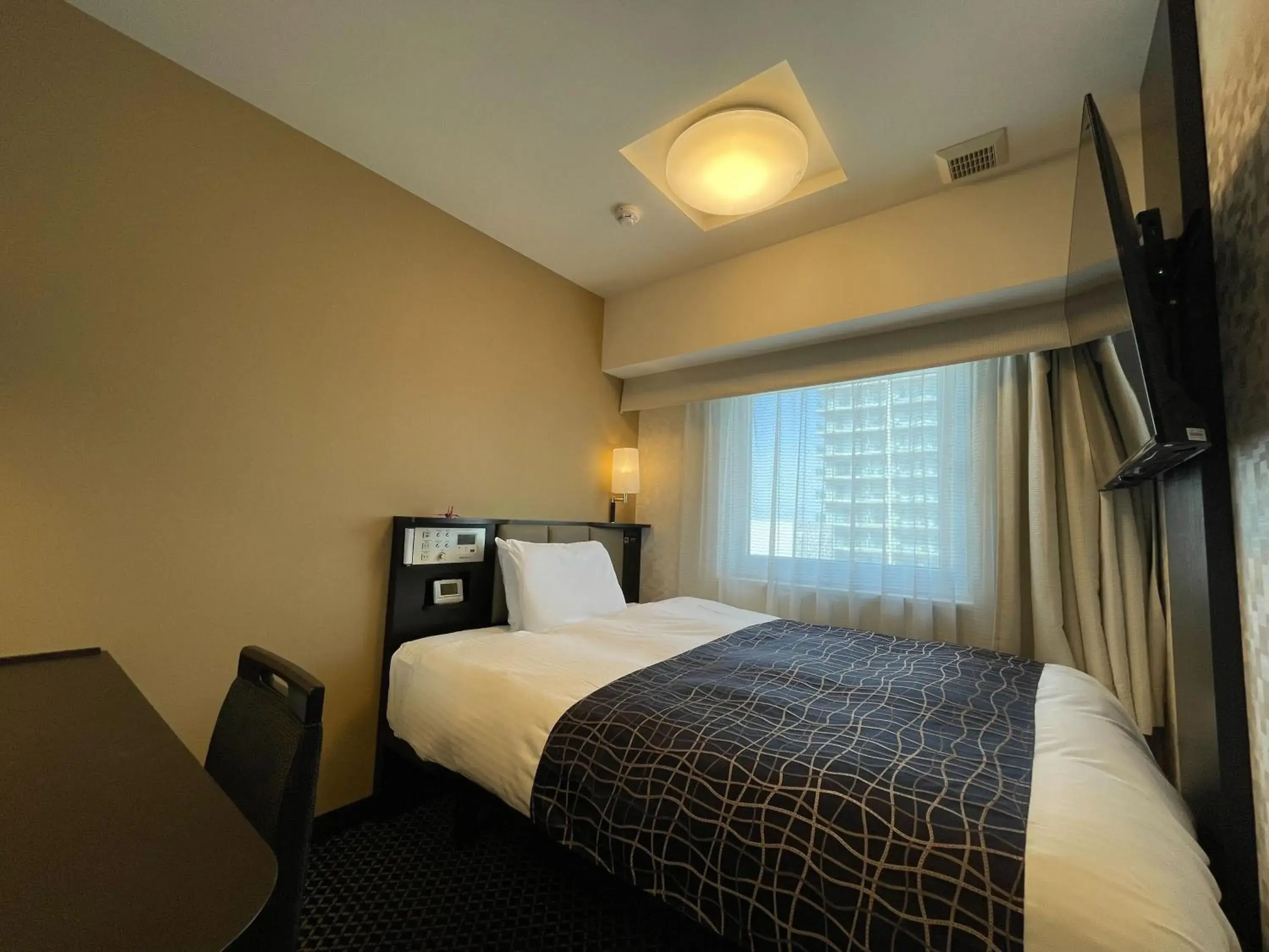 Bed in APA Hotel Nagoya Sakae Kita Bed in APA Hotel Nagoya Sakae Kita