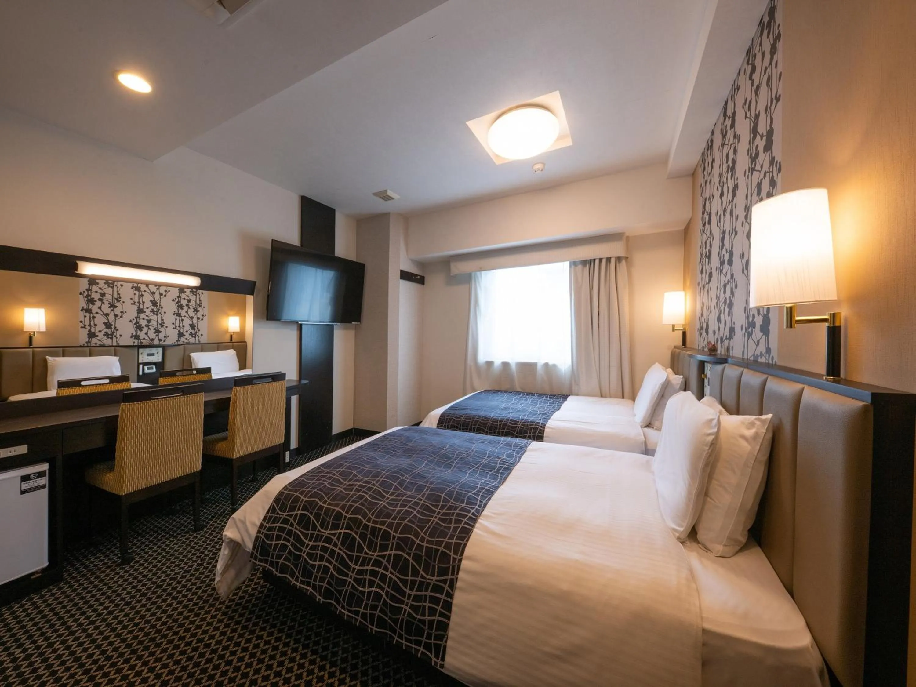 Bed in APA Hotel Nagoya Sakae Kita